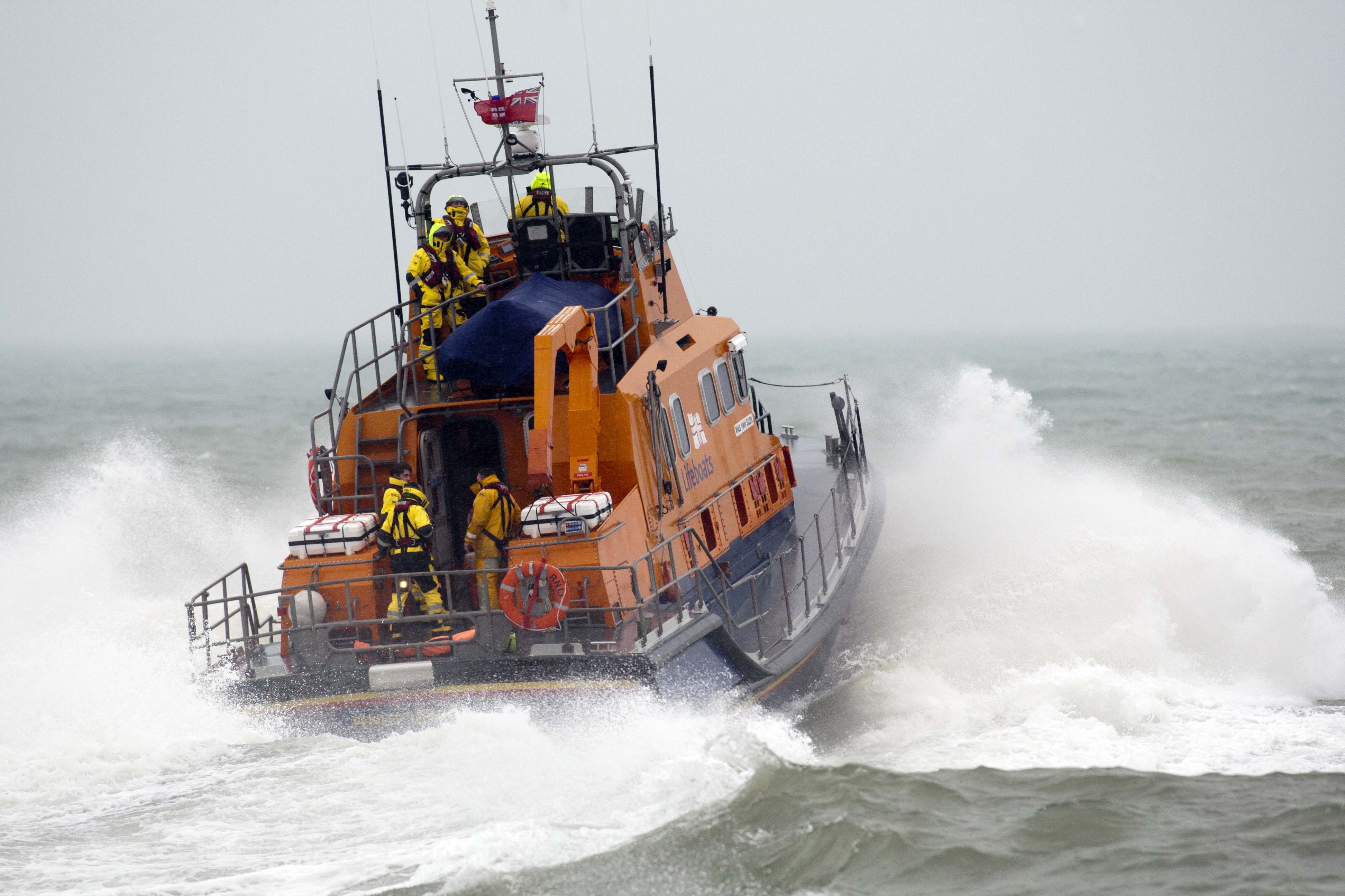 Picture shows an all-weather lifeboat under way