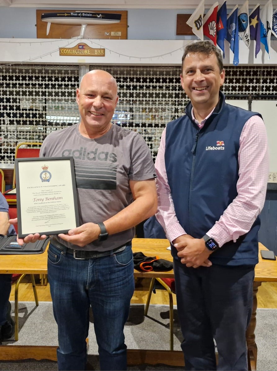 Tony receiving Excellency in Volunteering award from the RNLI