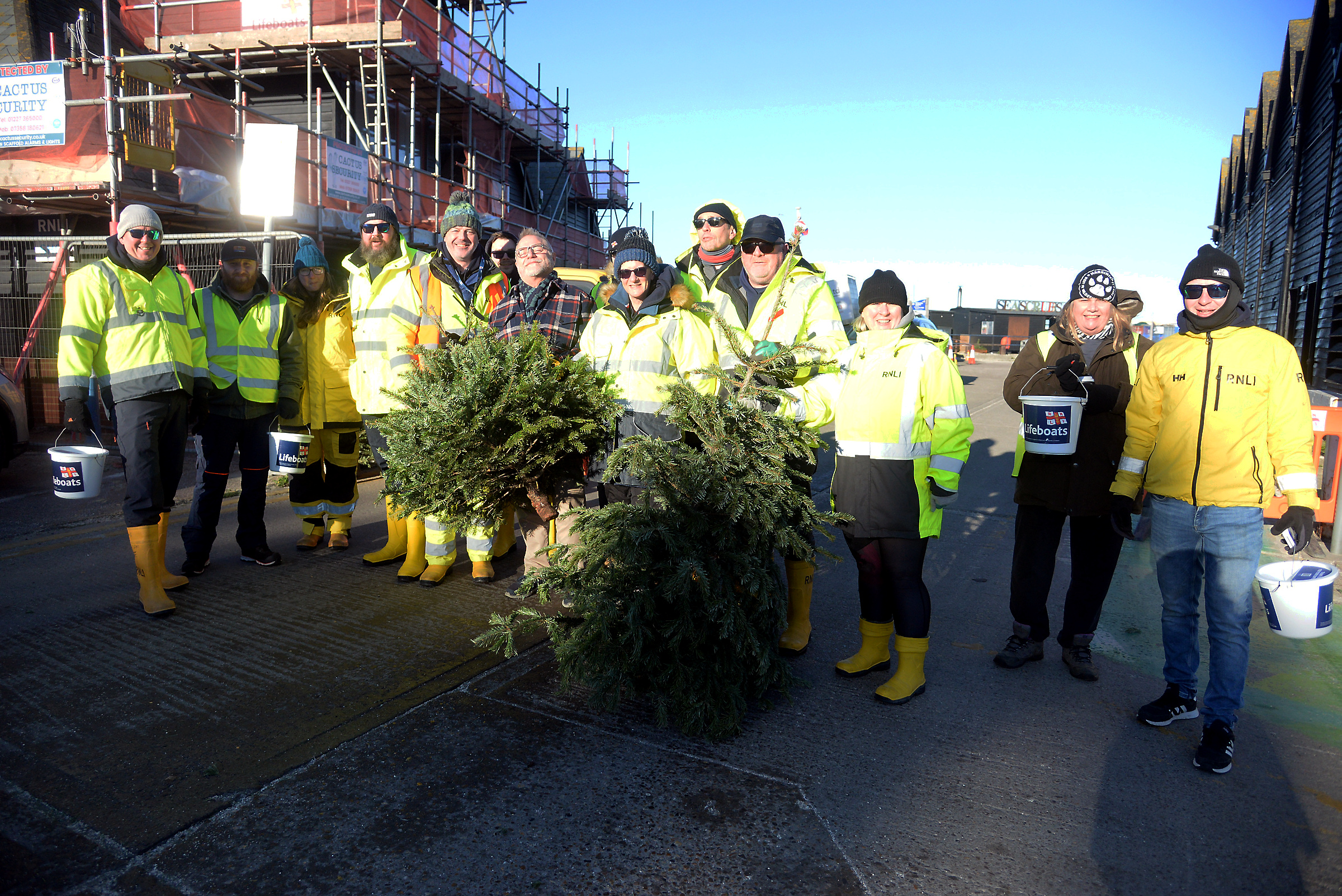 The team involved with the Christmas tree chipping at Whitstable RNLI on Sunday.