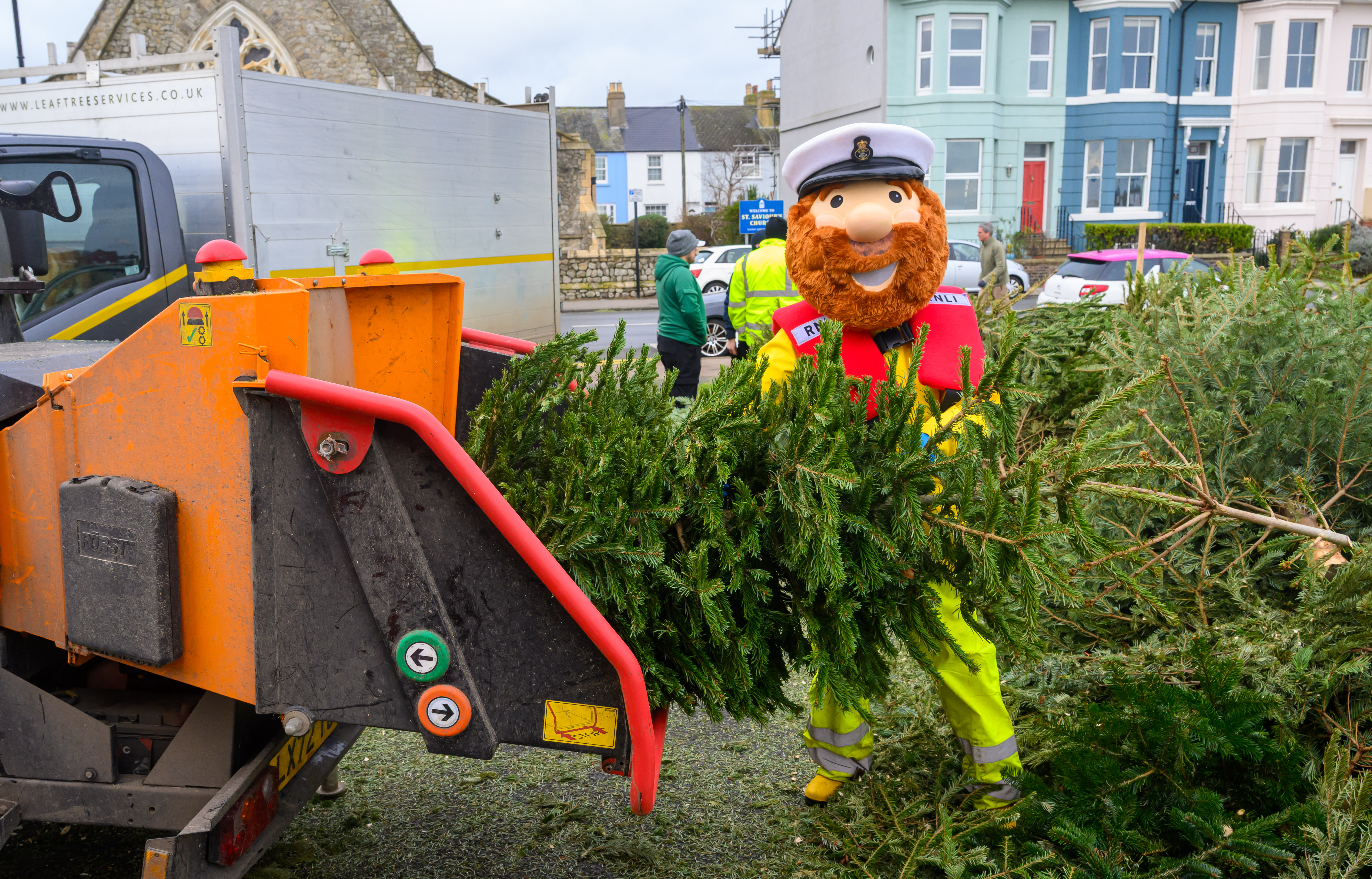 Stormy Stan helps load the chipper
