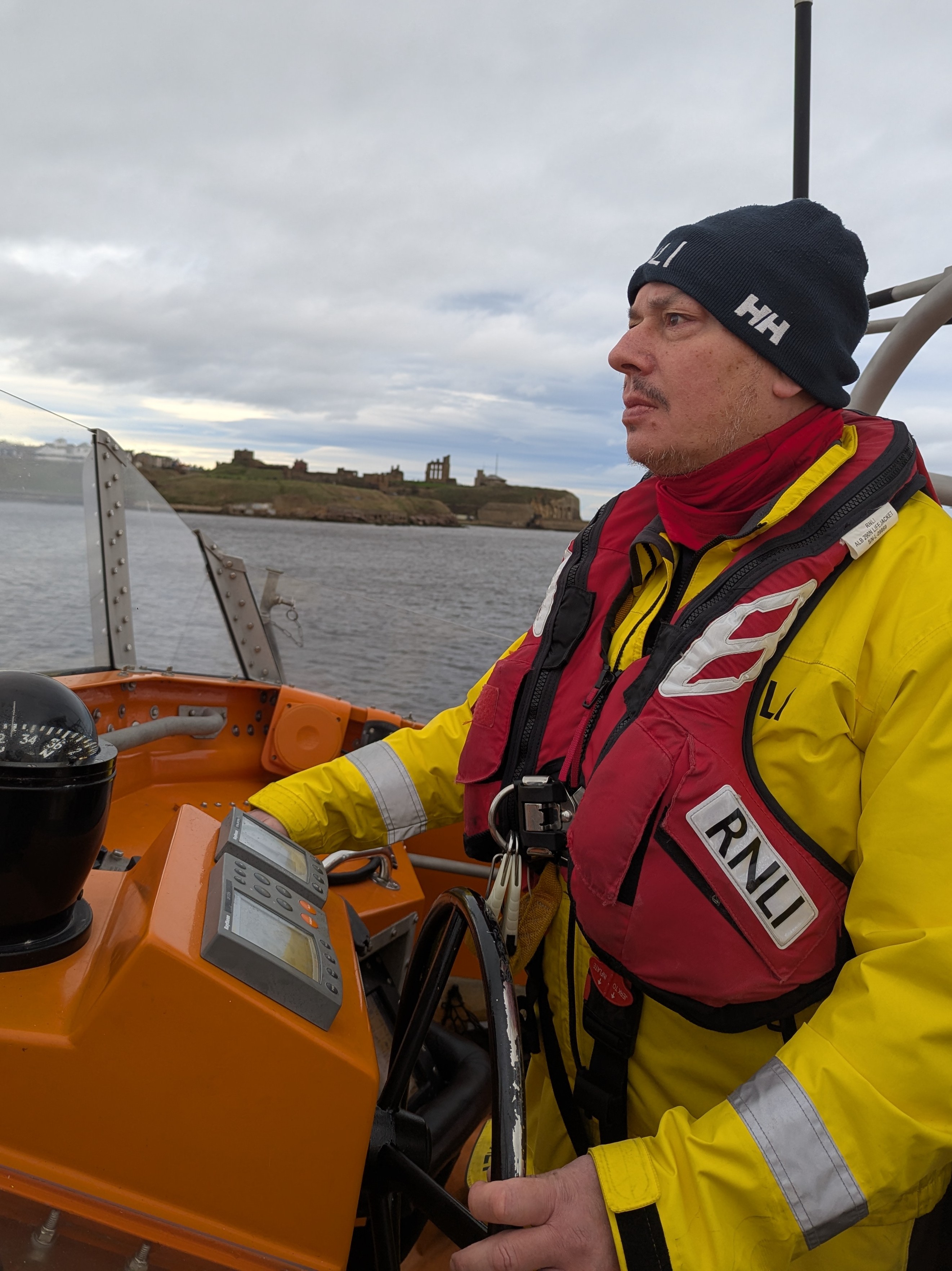 Enzo at the helm of Tynemouth lifeboat 