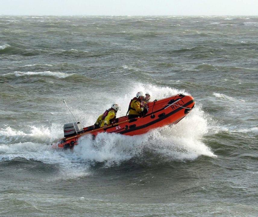 Exmouth RNLI inshore D-Class lifeboat, George Bearman II, launches into challenging weather conditions sent by Storm Ingrid