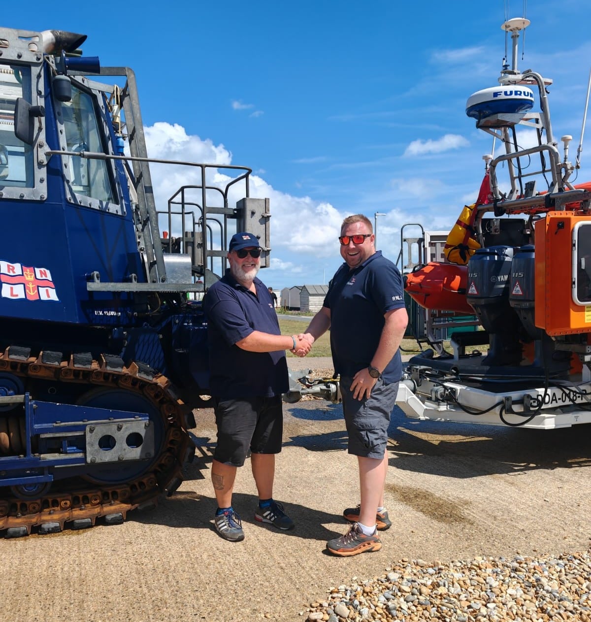 Mike Dodkins with Walmer's Lifeboat Training Co-Ordinator Lee Waddon.
