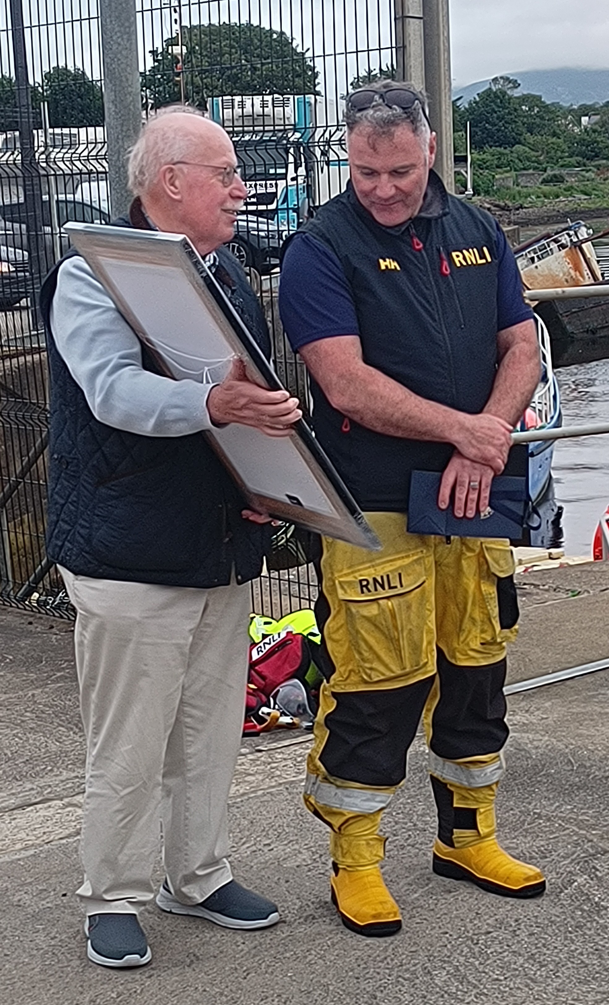 John McCarter making a presentation to Eamonn Mahon on his retirement from Lough Swilly RNLI
