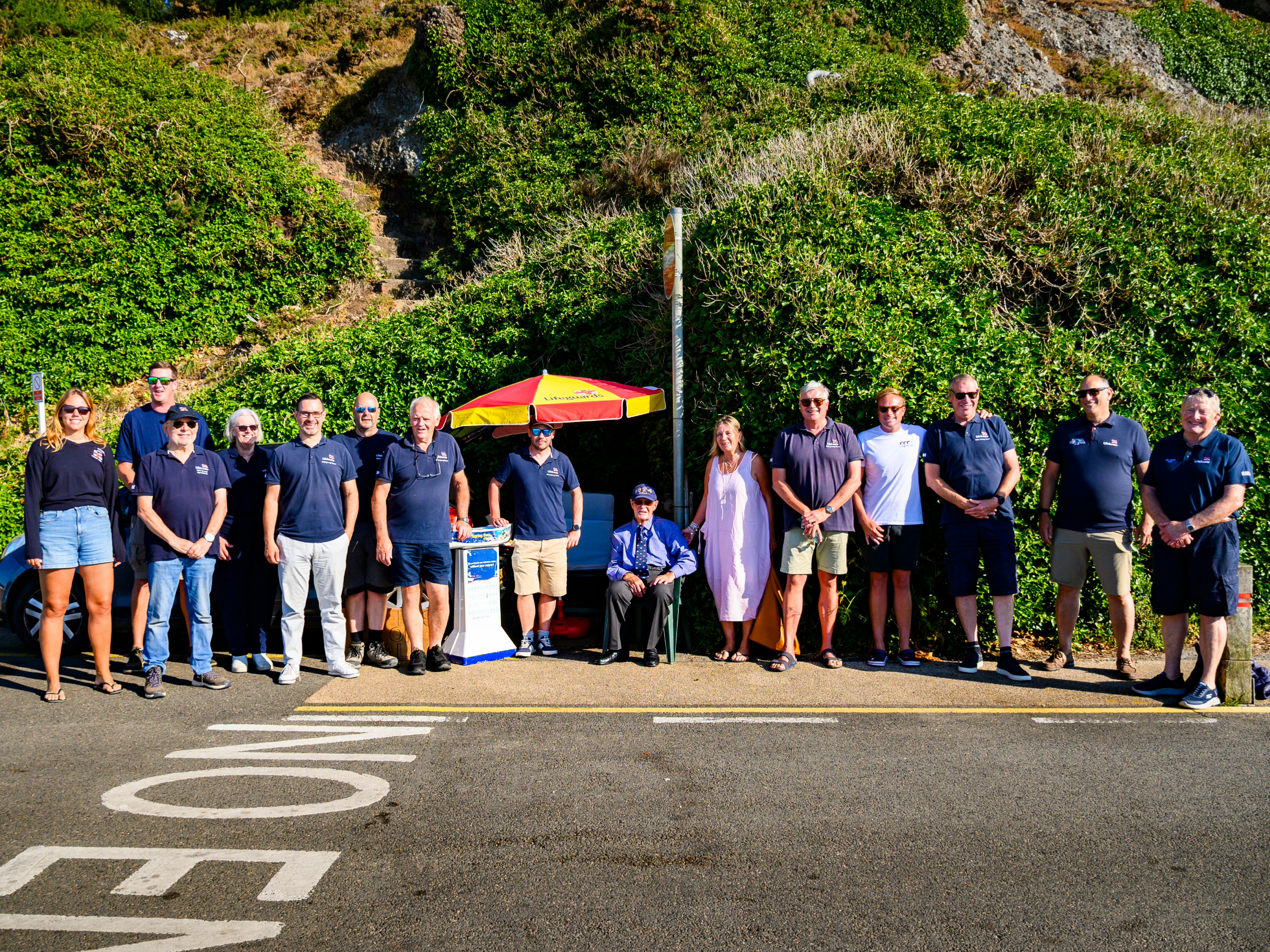 The RNLI Jersey St Catherine's crew receiving the cheque from a representative of the donating trust and with Colin Shales, fundraiser extraordinaire.