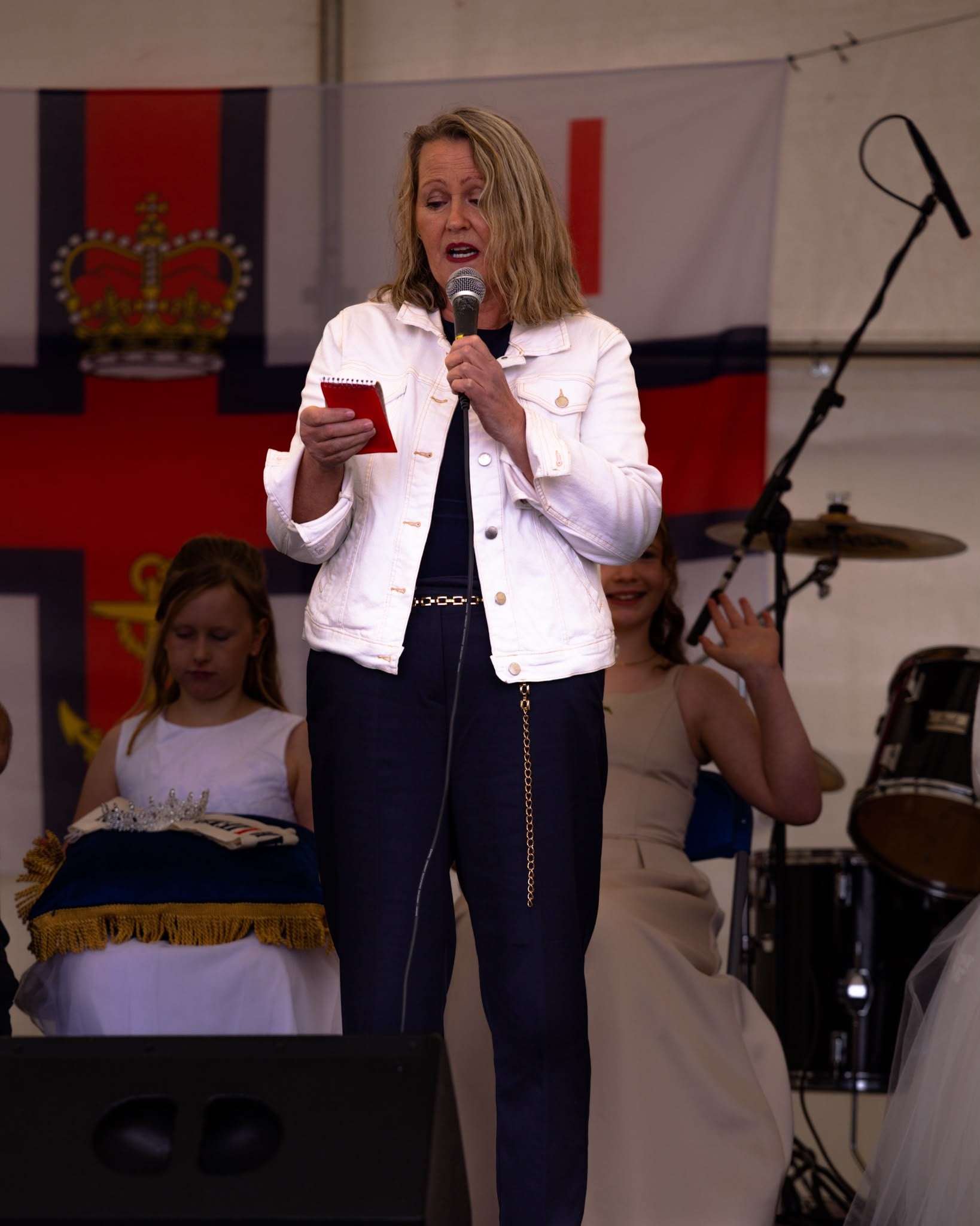 Woman with microphone.