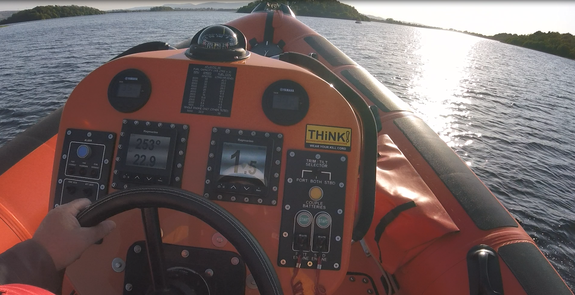 Photograph taken from the head camera that the crew member on the helm seat is wearing. It shows the lifeboat approaching the casualty vessel.