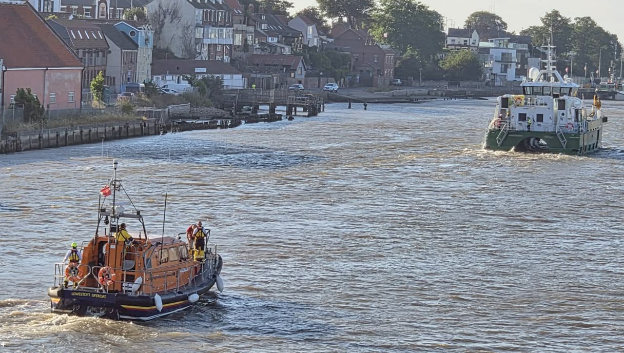Lowestoft RNLI Lifeboat escorting the Crew Transfer Vessel which was taking on water