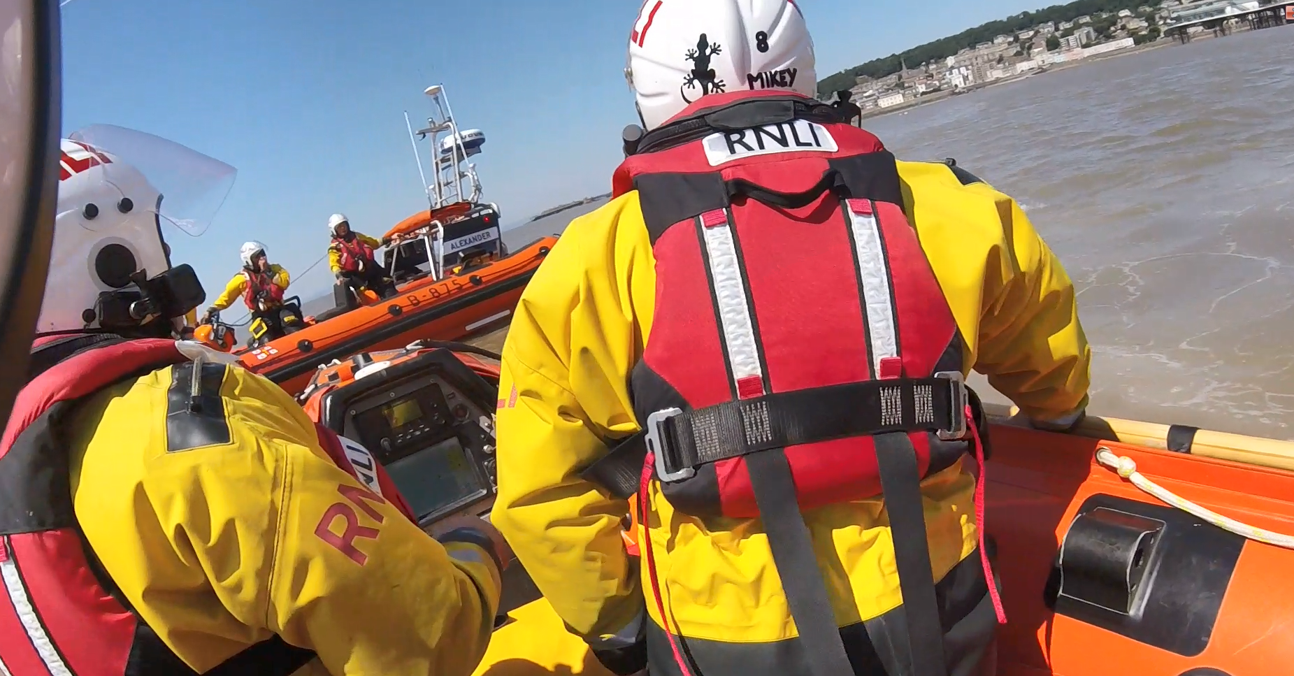 Screenshot of head cam footage of child rescue on 11 July from the D Class Lifeboat showing crew in Weston Bay and the Atlantic Lifeboat in the background