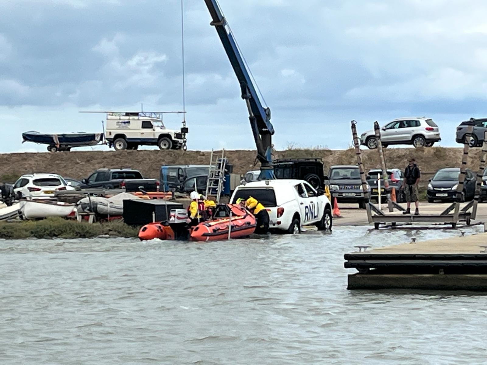 RNLI Aldeburgh launching their D-Class Susan Scott into the river Alde and Ore at Aldeburgh Yacht Club, by Lizzie Clark