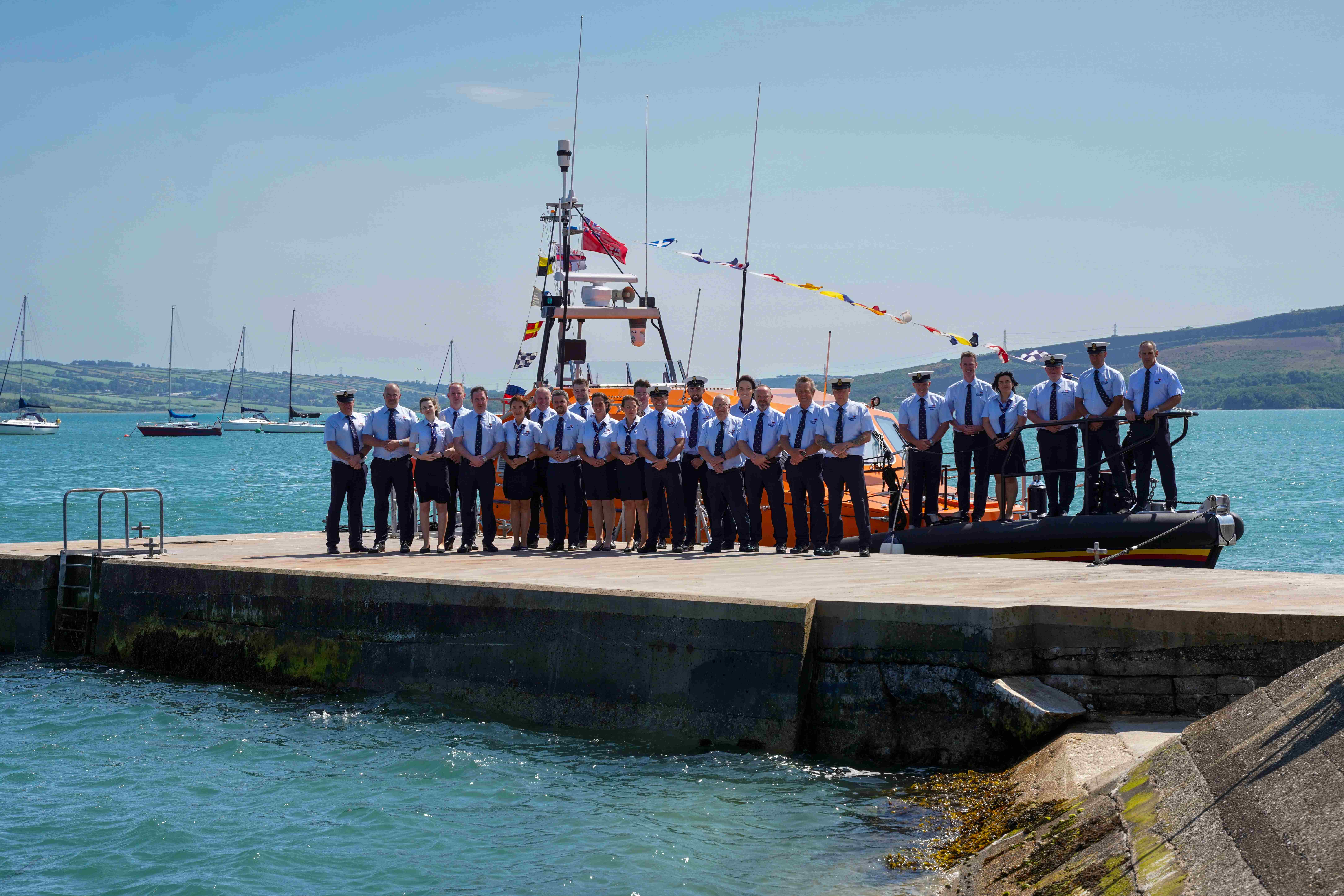 Larne RNLI volunteers pictured alongside their new Shannon class lifeboat