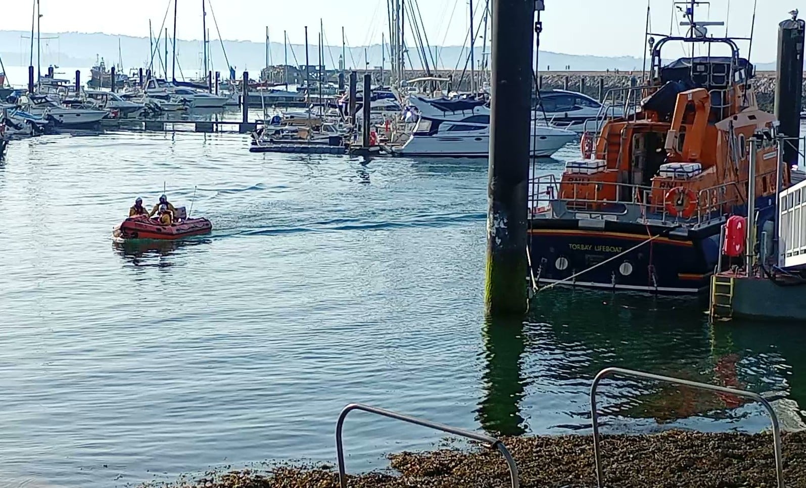 Torbay RNLI's All-Weather and Inshore lifeboats in Brixham harbour