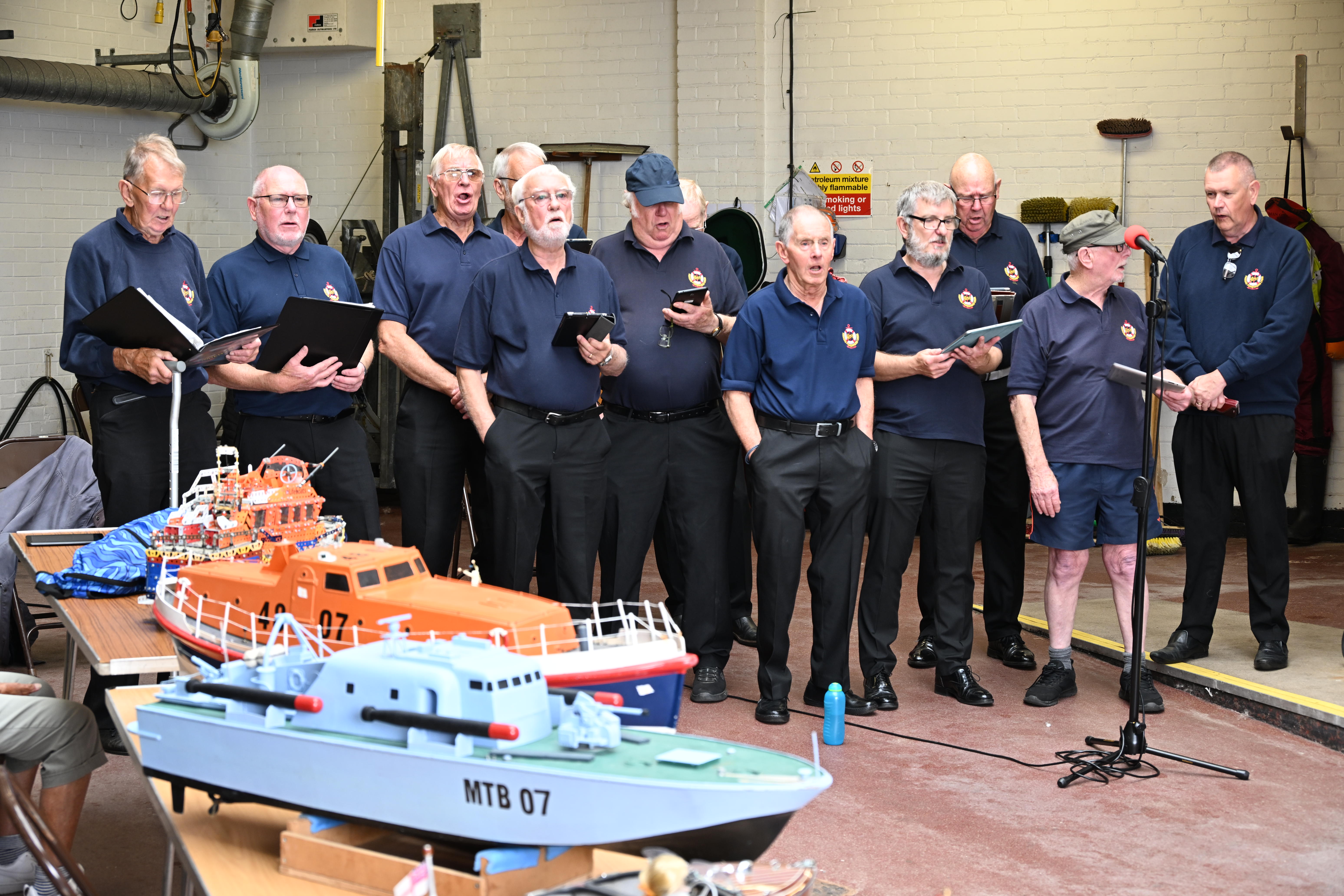 Choir singing in the Redcar RNLI Boathouse