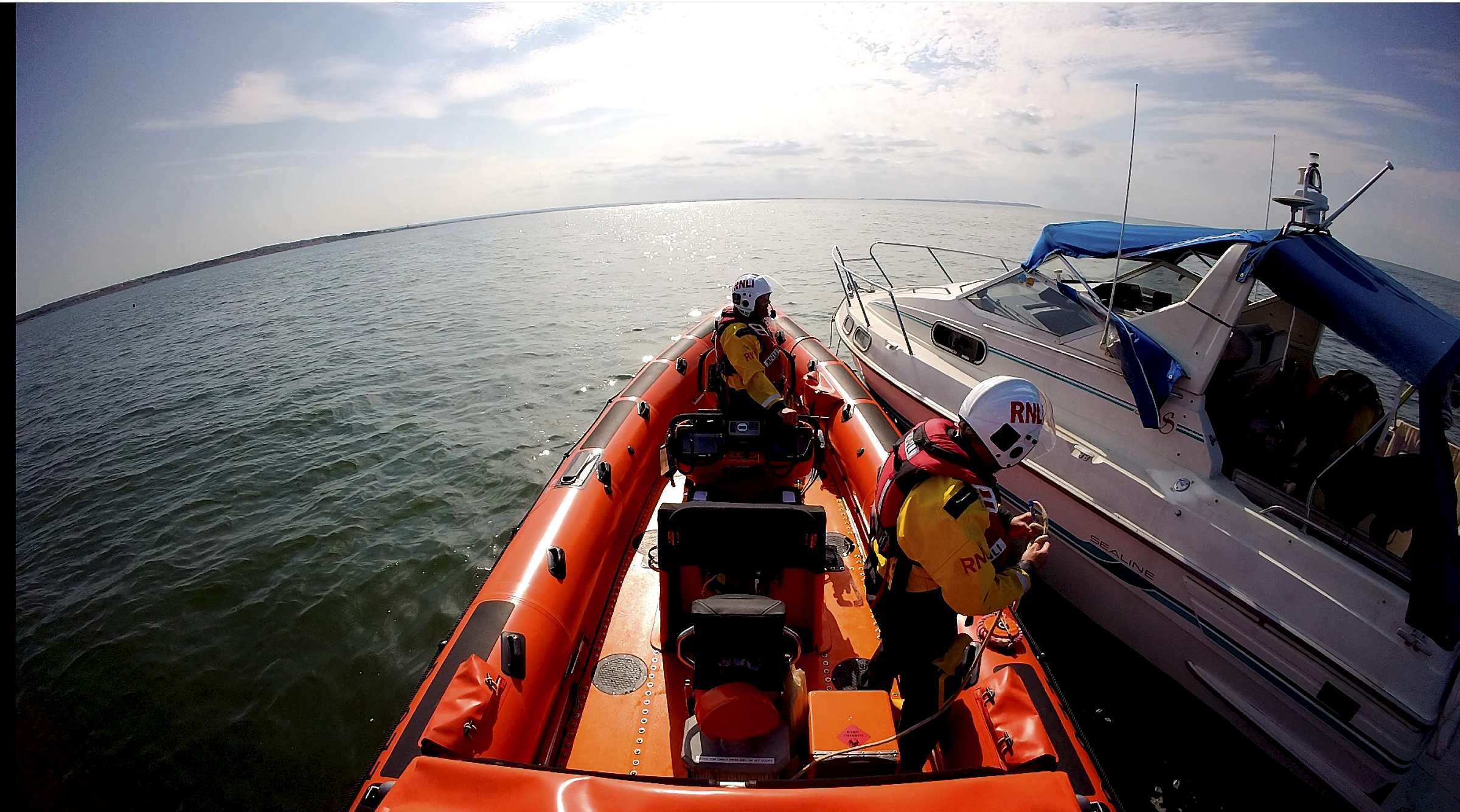 Whitstable lifeboat alongside the 9-metre motor cruiser that took on water off Long Rock, Whitstable on Tuesday afternoon.