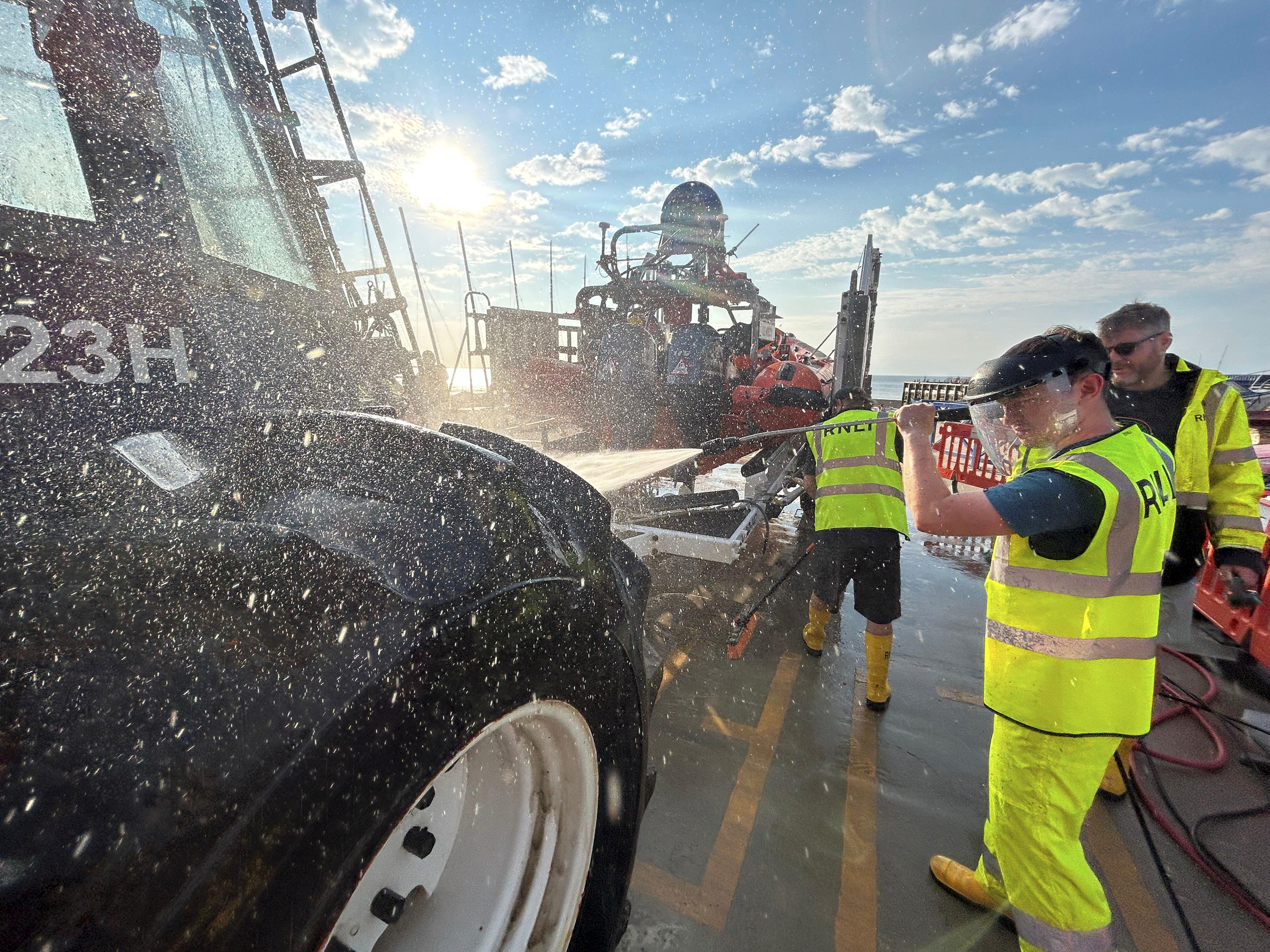 As ever the shore crew are on hand to recover and washdown the boat, launching tractor and carriage.