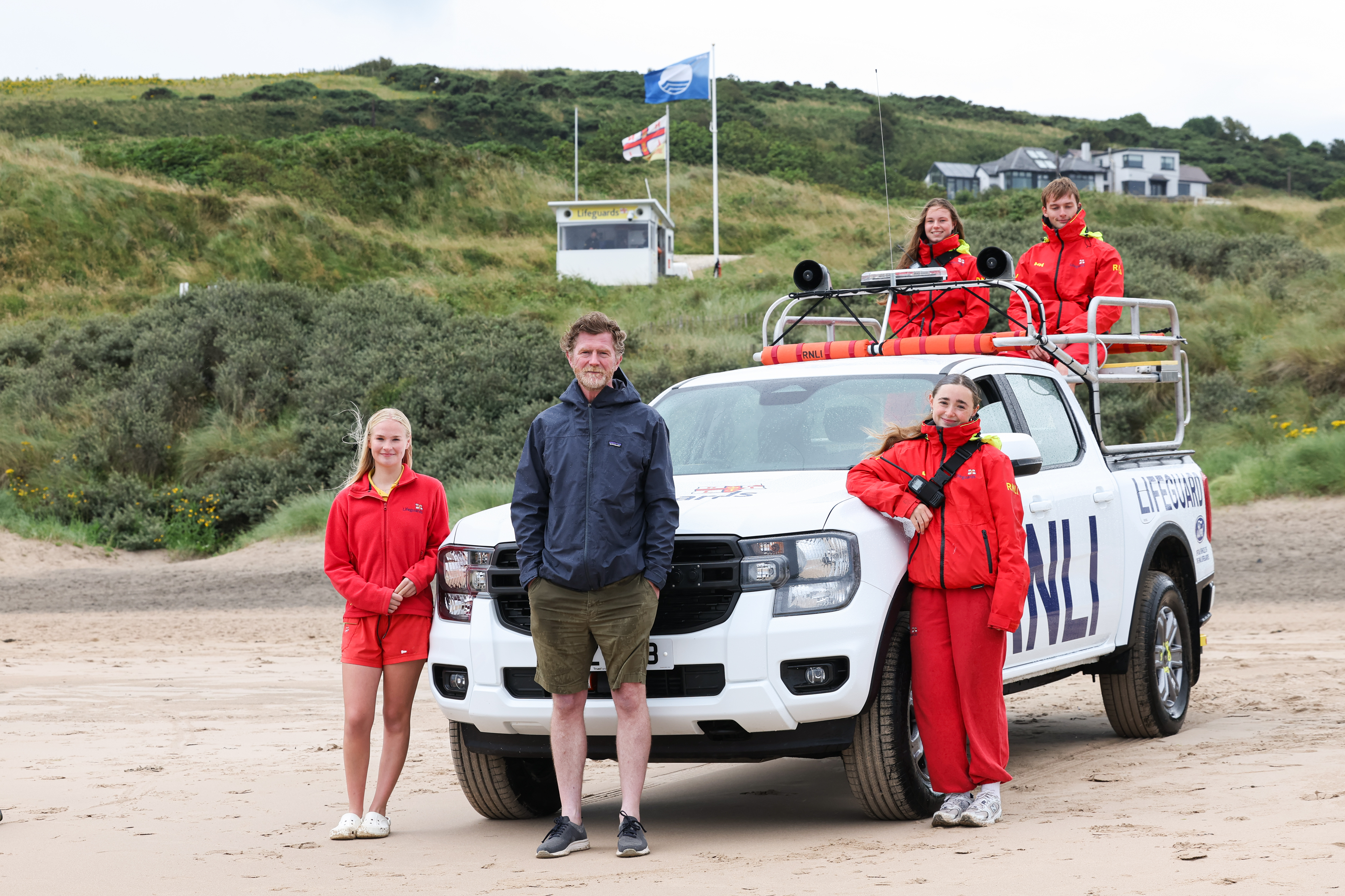 Andrew Todd with the lifeguard team at Whiterocks Beach in Portrush