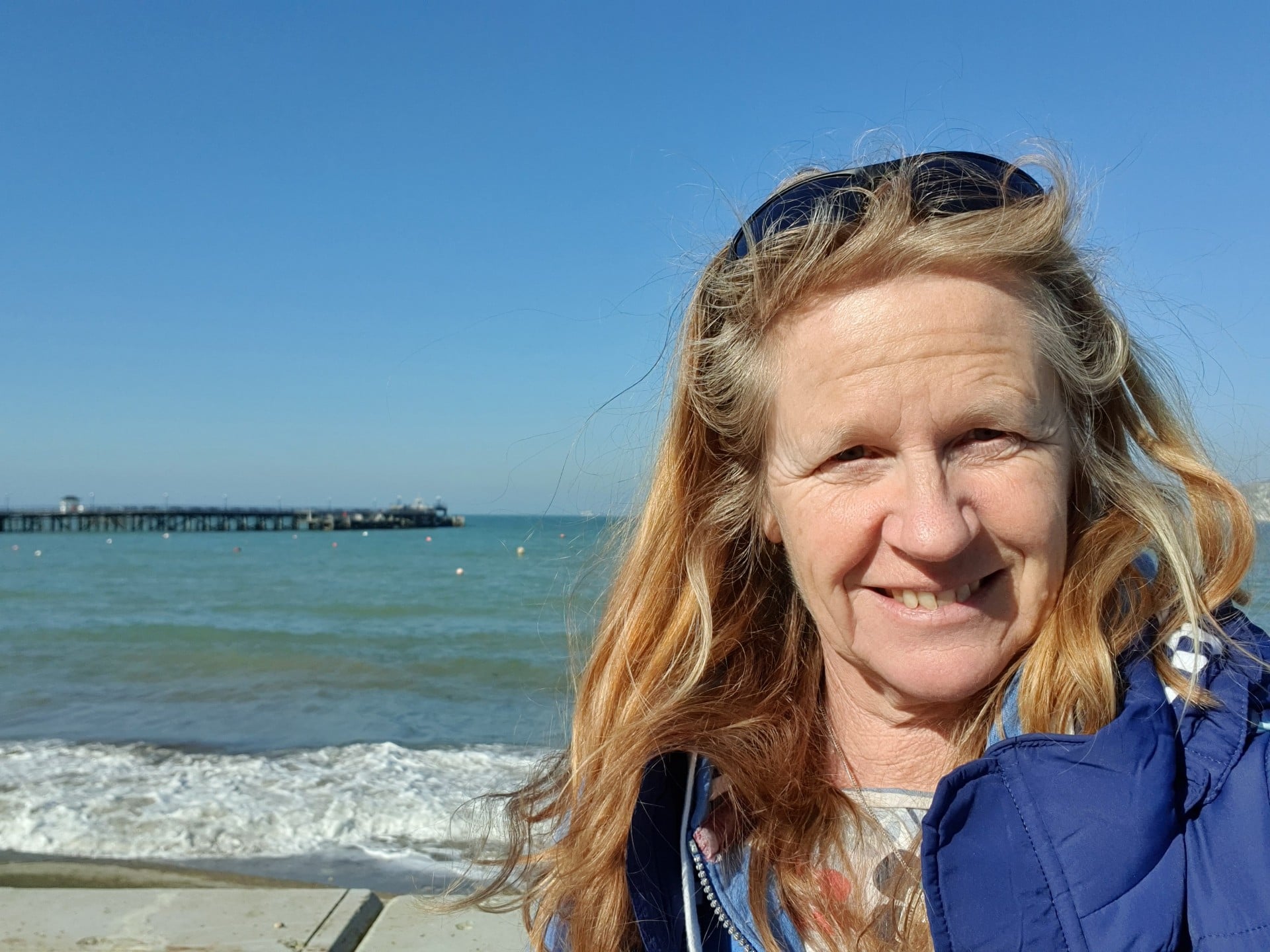 Swanage RNLI Launch Authority Holly Phillips, standing by the sea