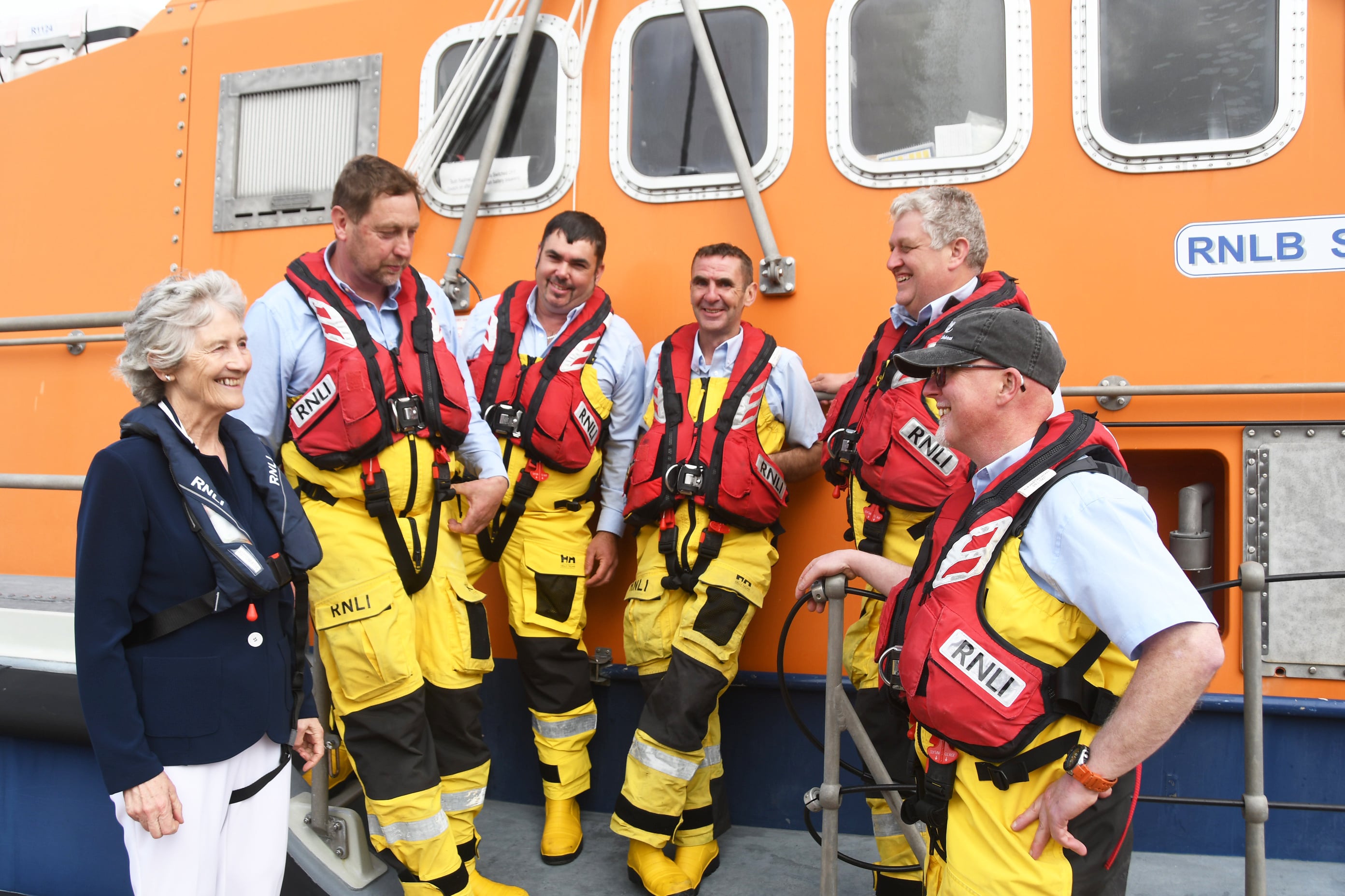 President of Ireland Catherine Connolly with members of Achill Island RNLI