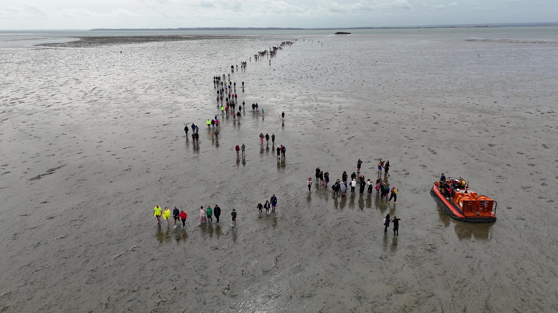 Southend RNLI hovercraft with runners at the 2025 fun run
