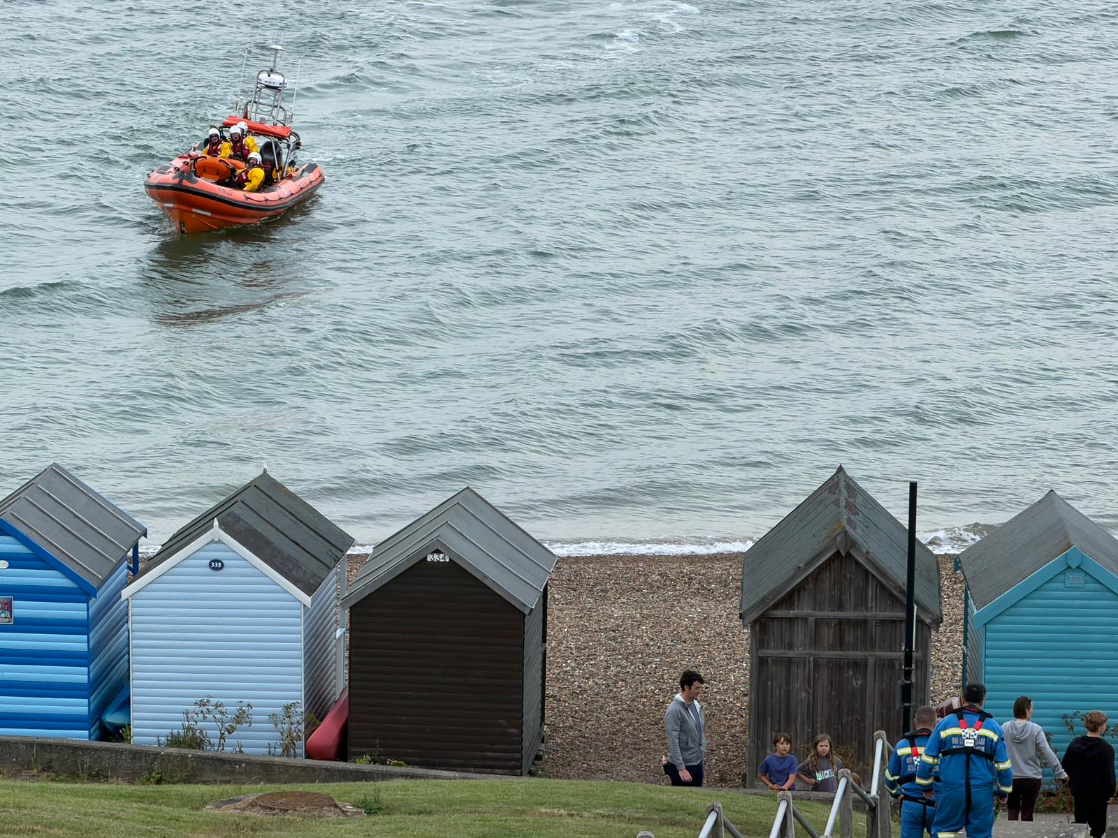 Whitstable lifeboat lands the kite surfer ashore at Herne Bay on Sunday evening.