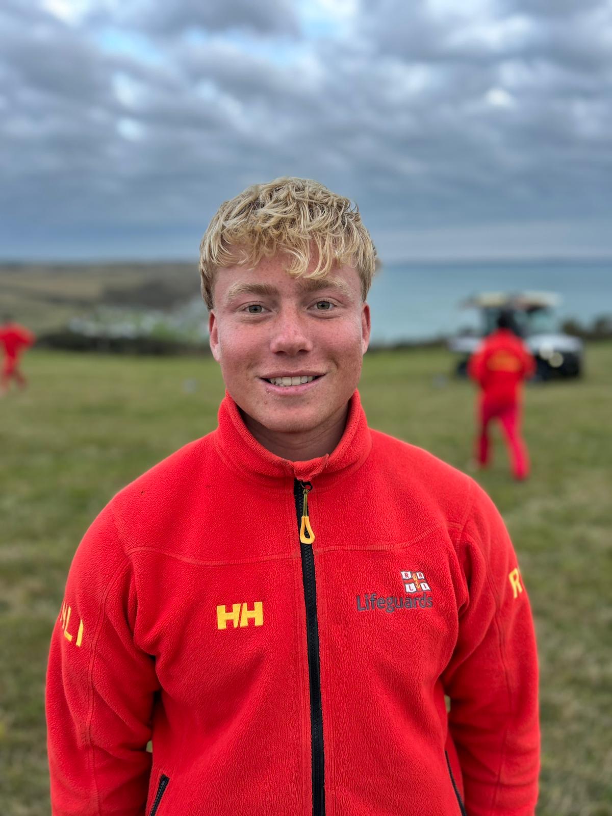 Portrait image of Cai in RNLI uniform 