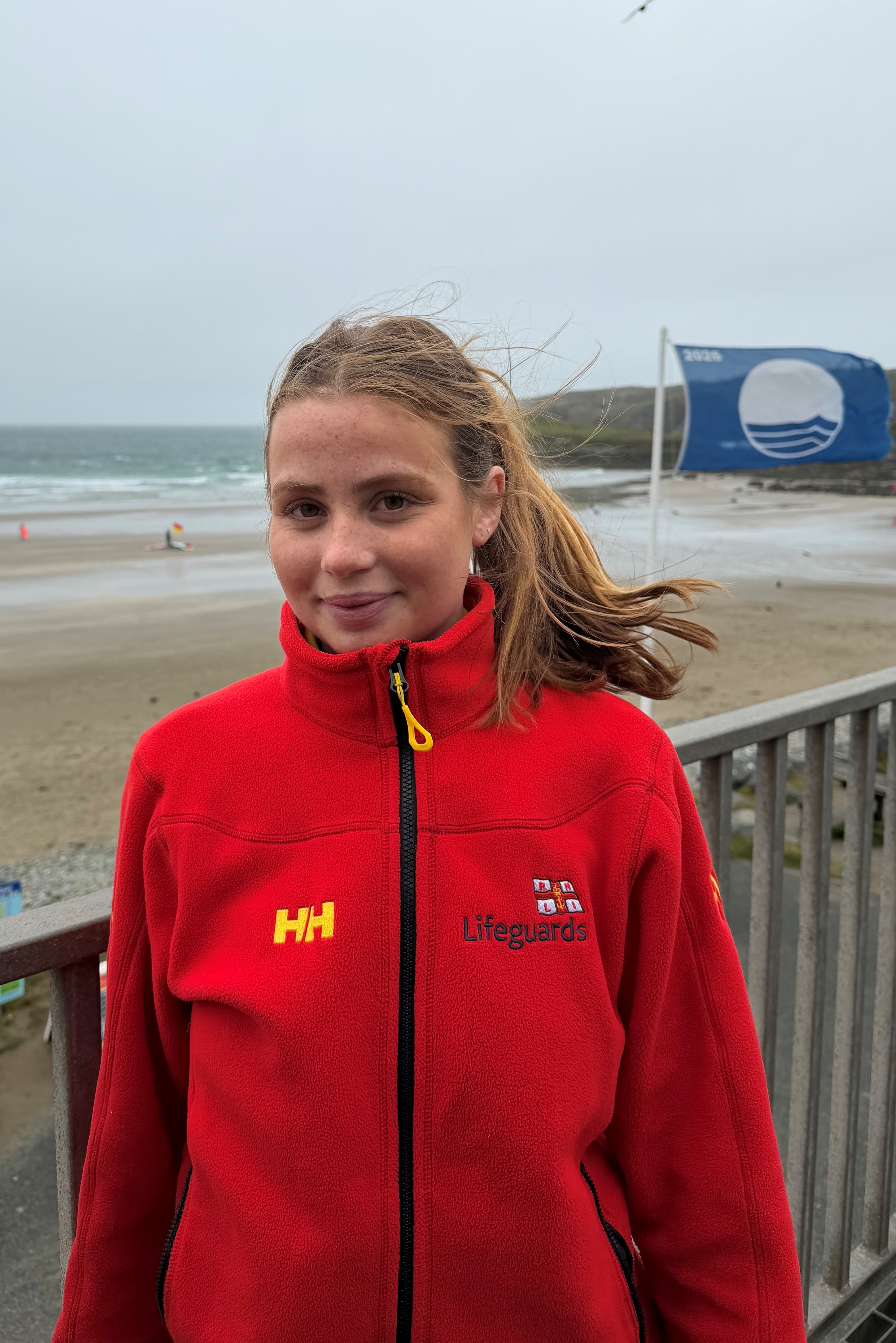 portrait image of Poppy in RNLI uniform 