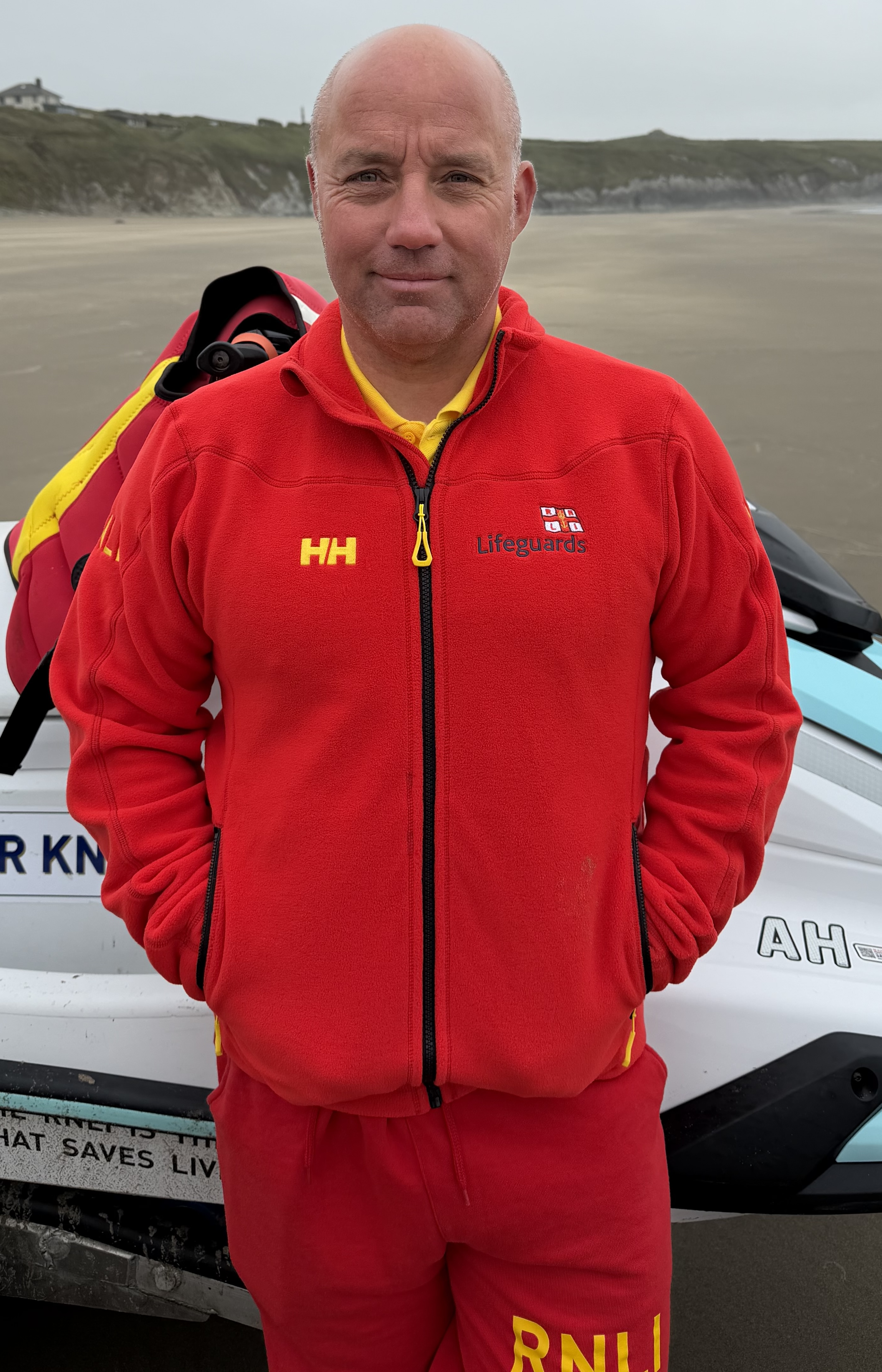 portrait image of Tom in RNLI uniform 