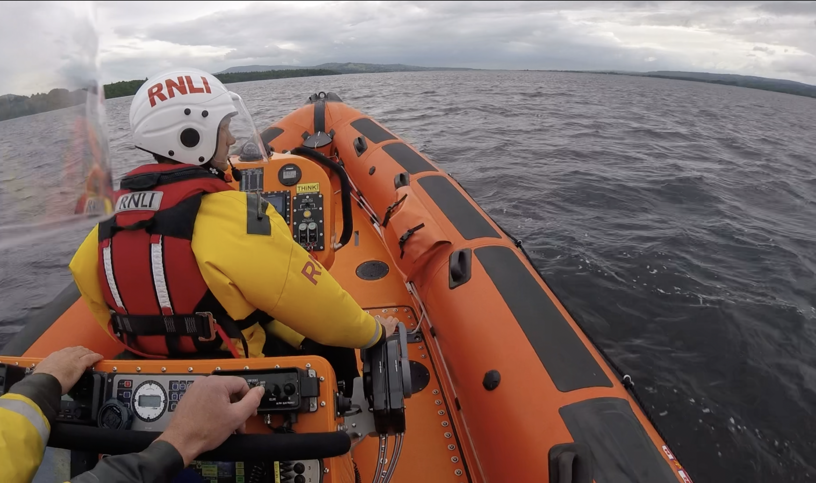 Crew 3 is looking over the right shoulder and the bow of the lifeboat as it makes way to a casualty vessel