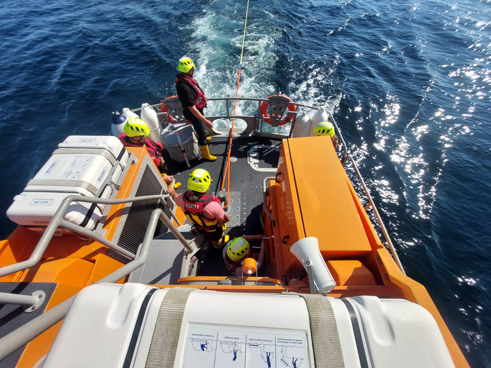 Picture of rear of lifeboat showing crew and tow rope