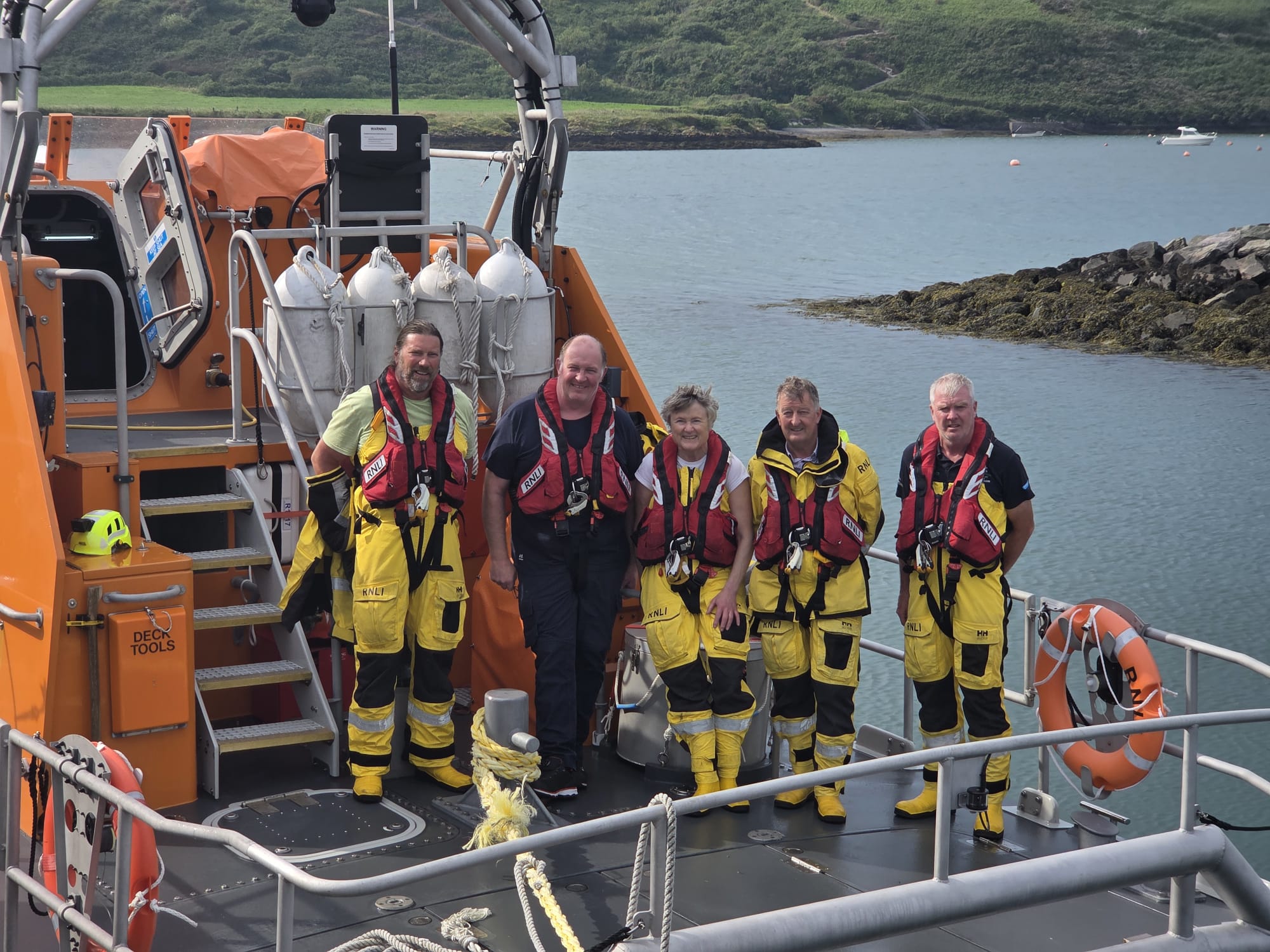 Baltimore RNLI crew L-R Eoin Ryan, Ollie O'Mahony, Maria Coleman, Coxswain Aidan Bushe and Mechanic Micheal Cottrell