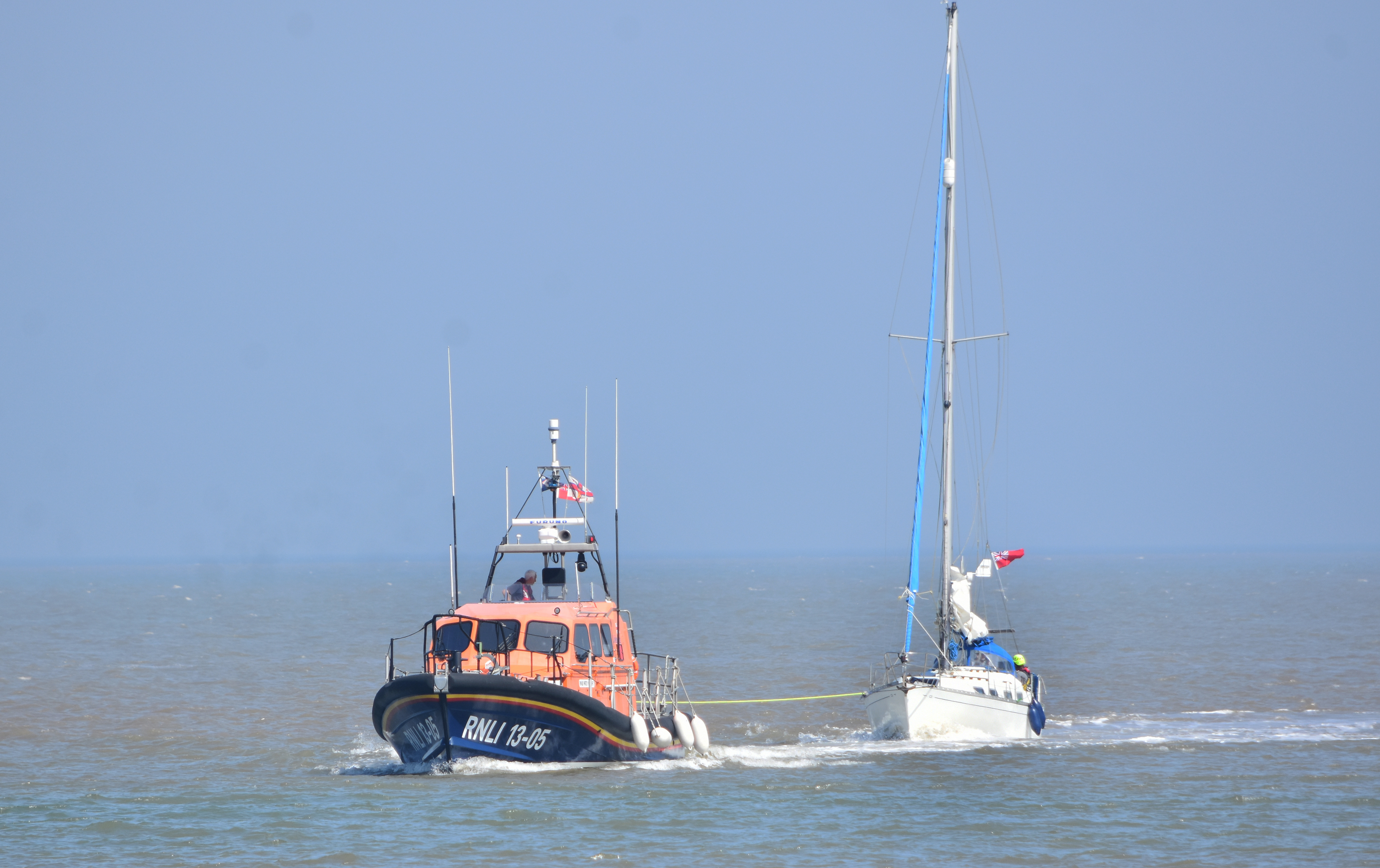 Lowestoft RNLI lifeboat towing the stranded yacht