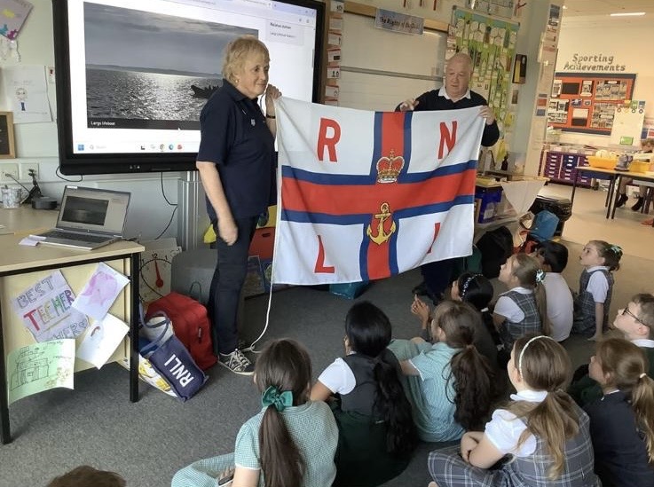 Alisa and Ronnie during a school visit