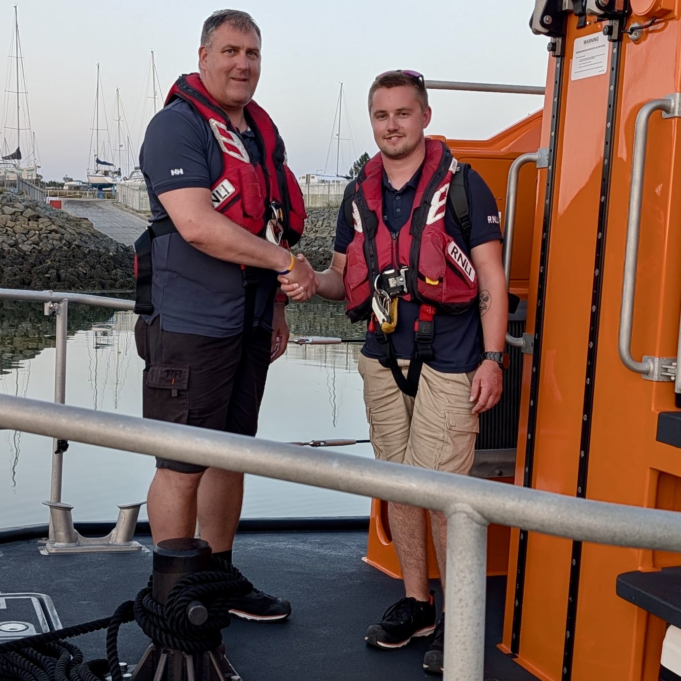 Dave Williams (right) with RNLI trainer. 