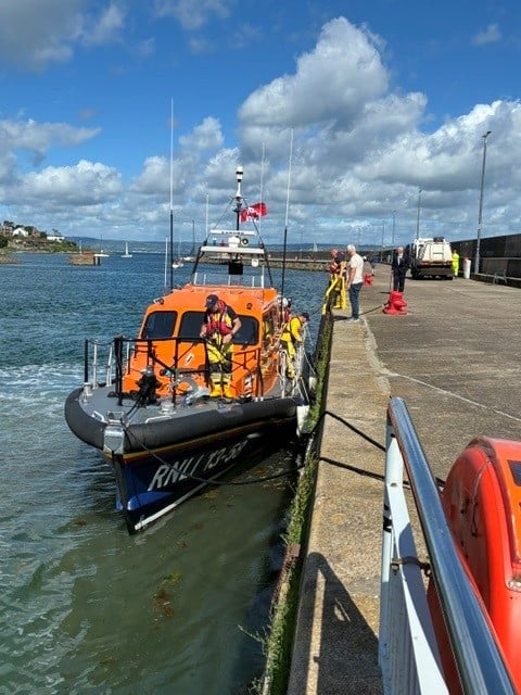 RNLI Lifeboat tied up on pier