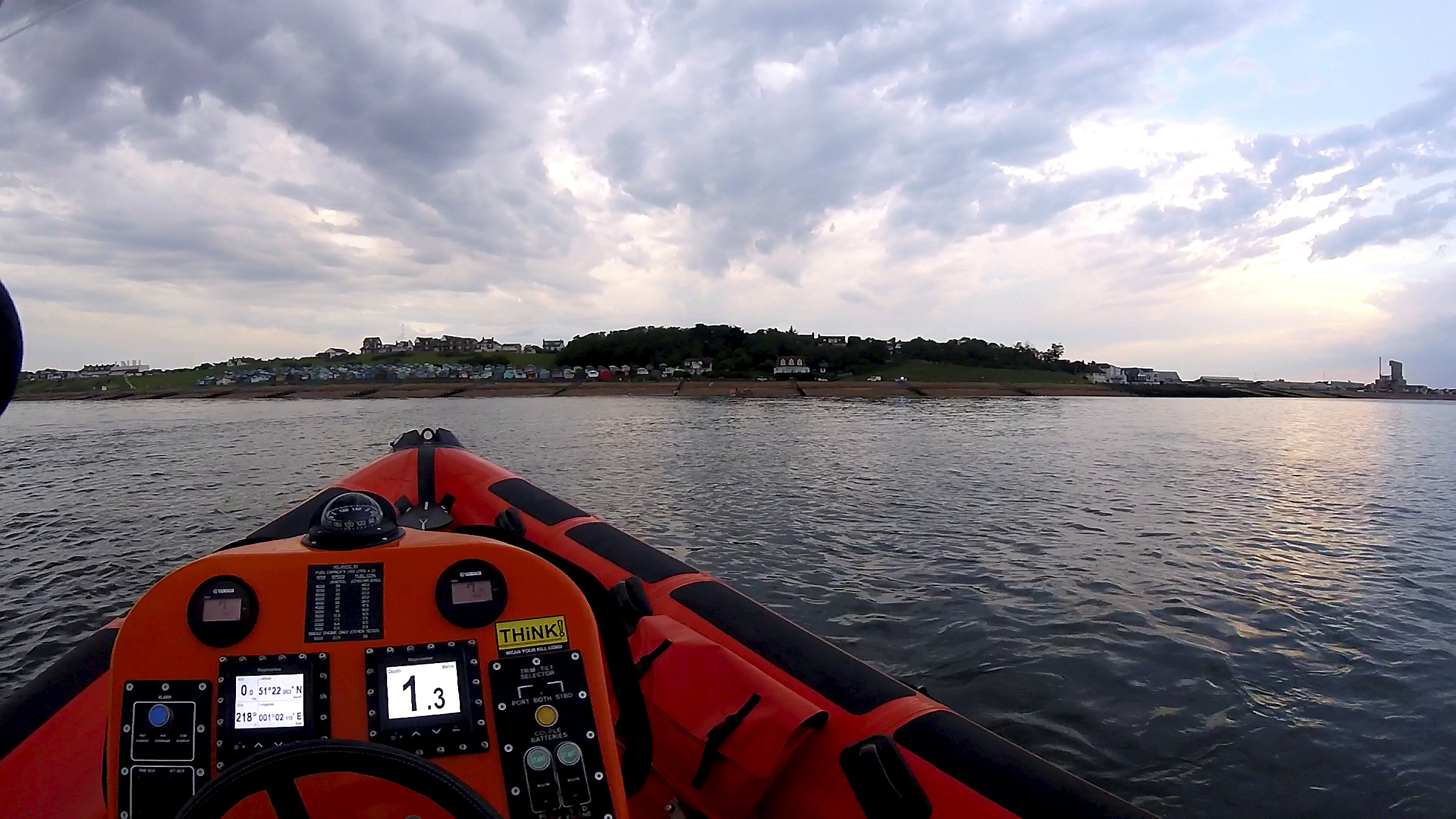 Whitstable lifeboat keeps watch on a number of persons in the water off 'The Street' Tankerton on Saturday.