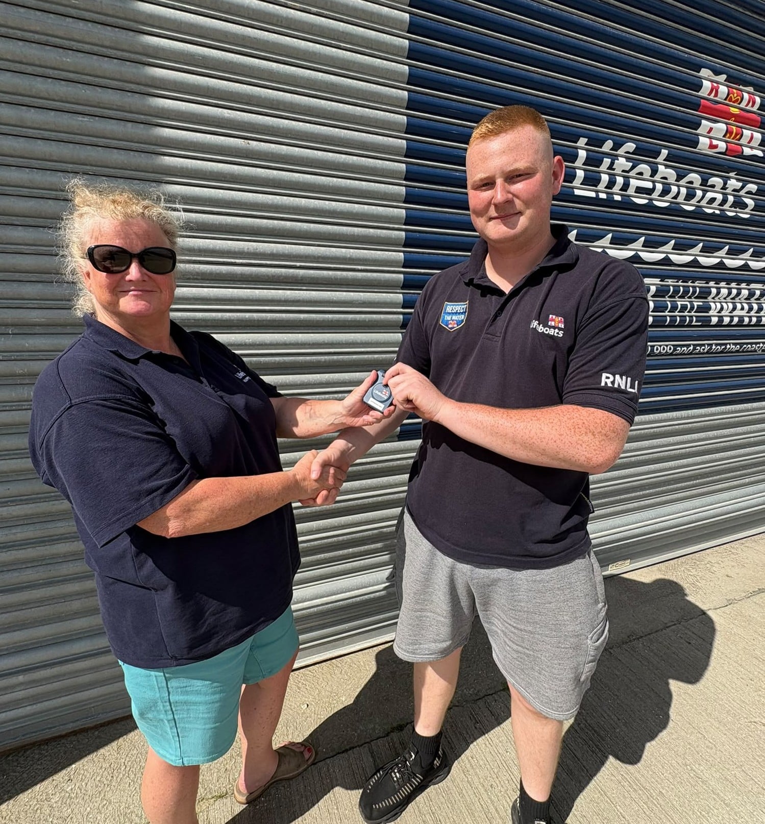 Liam fairwather receiving his pager from LOM