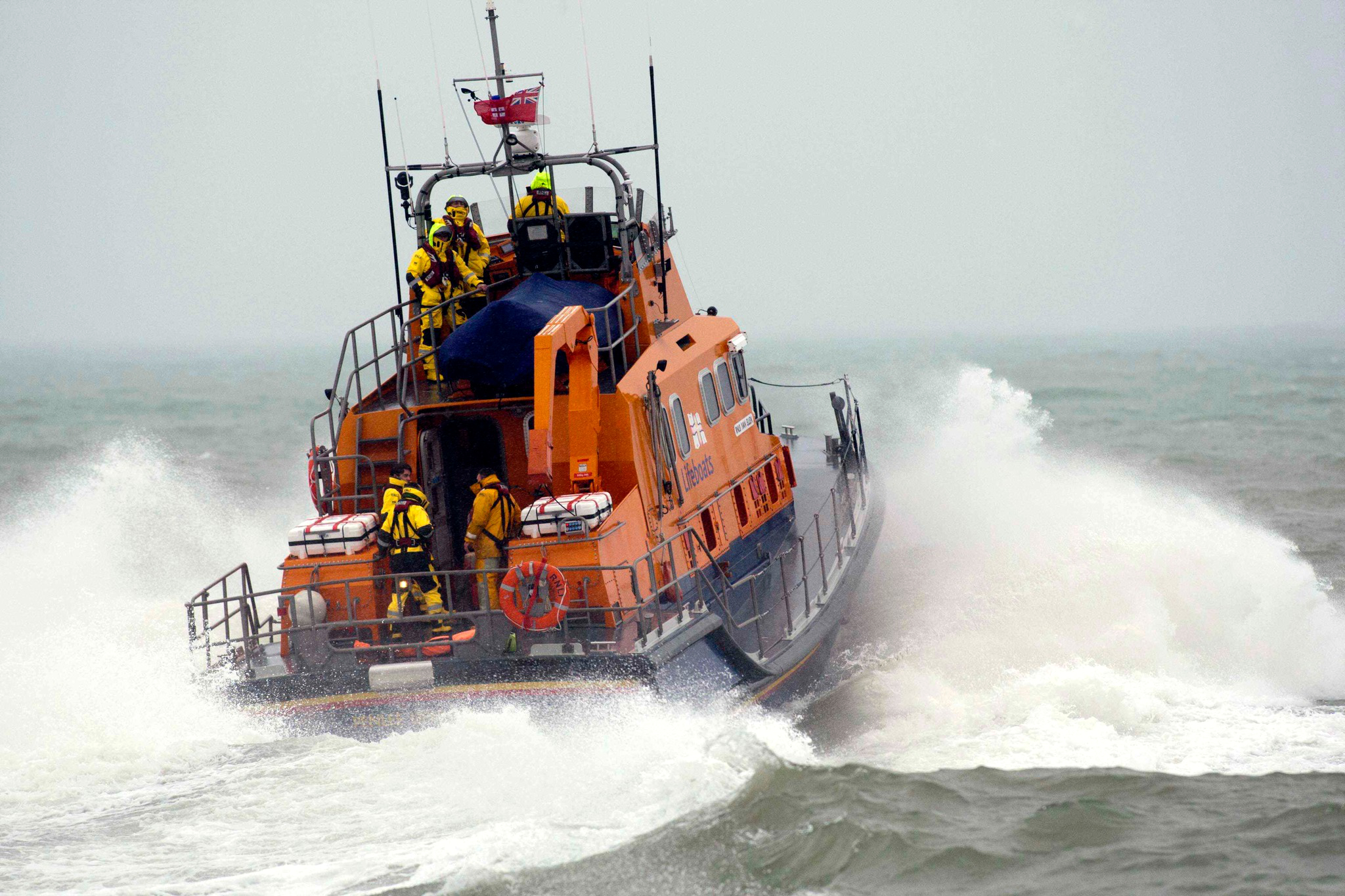 This file picture shows a lifeboat making way in poor weather