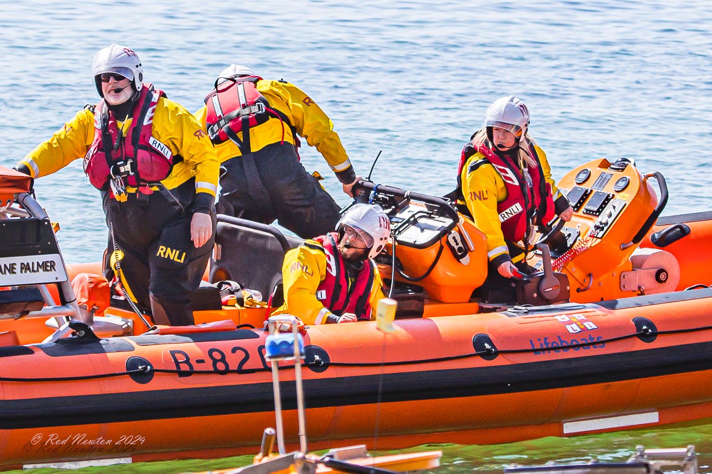 Adria at the helm during an exercise at sea.