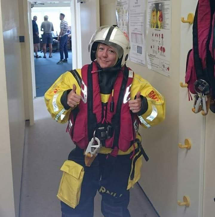 Andria wearing full Suit, lifejacket and helmet.
