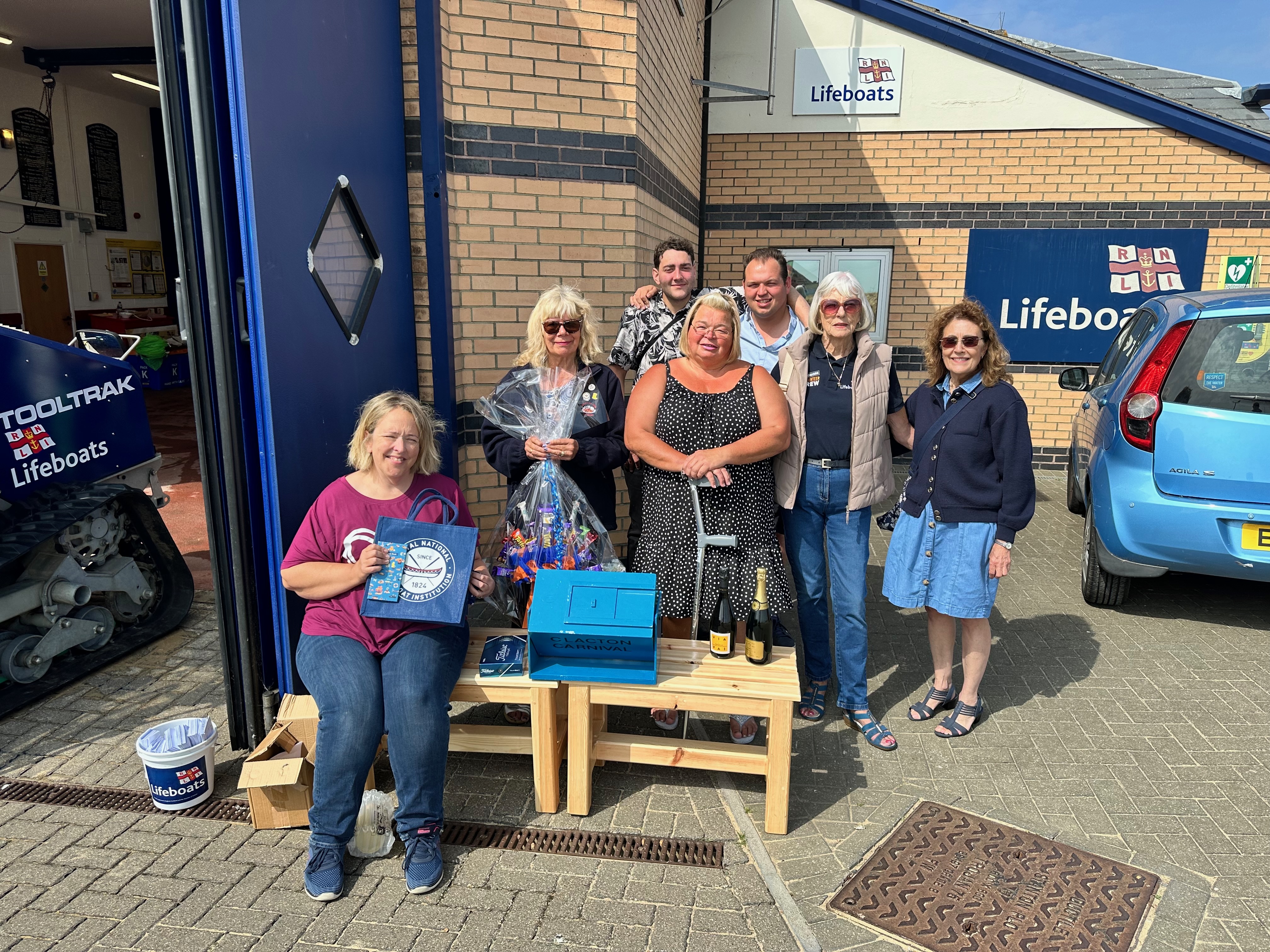 Sue (Centre) and her team of volunteer fundraisers.