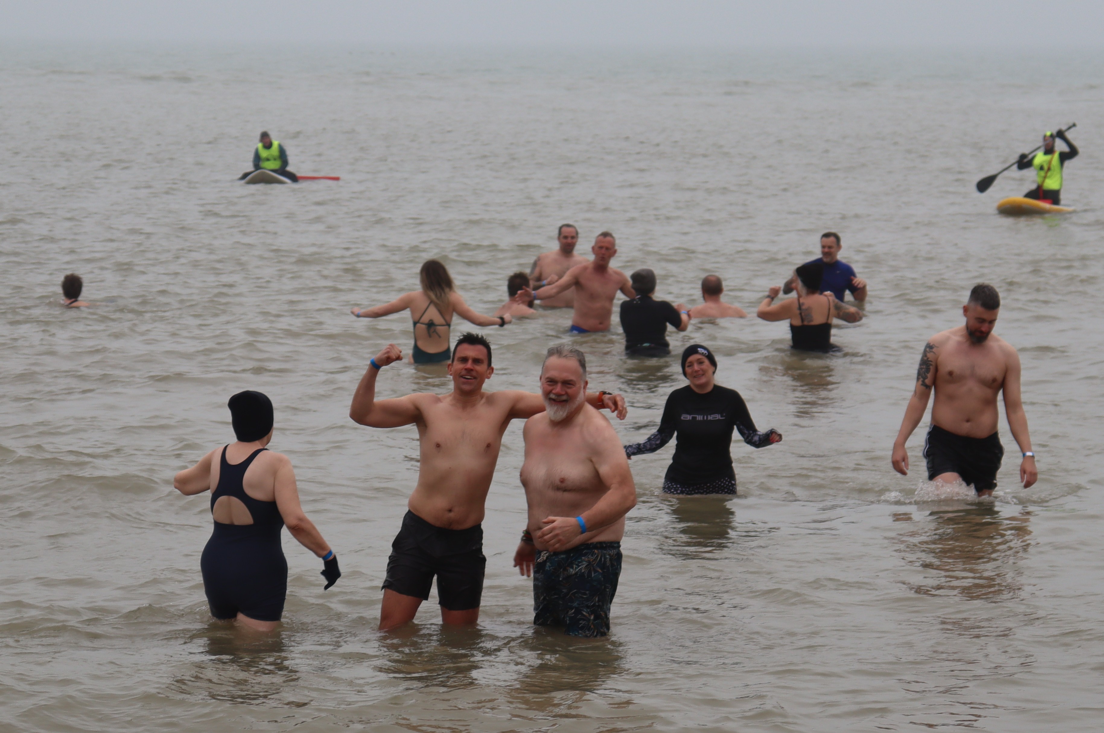 Members of Hastings RNLI crew in the bitterly cold sea