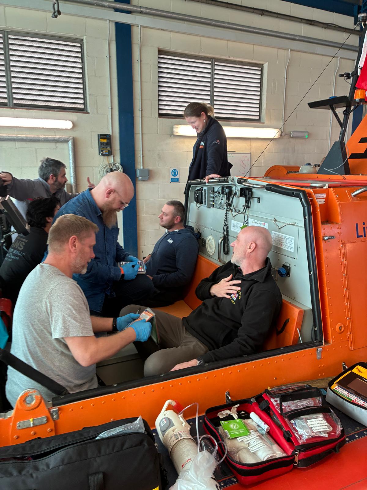 Volunteers simulate casualty care onboard the hovercraft