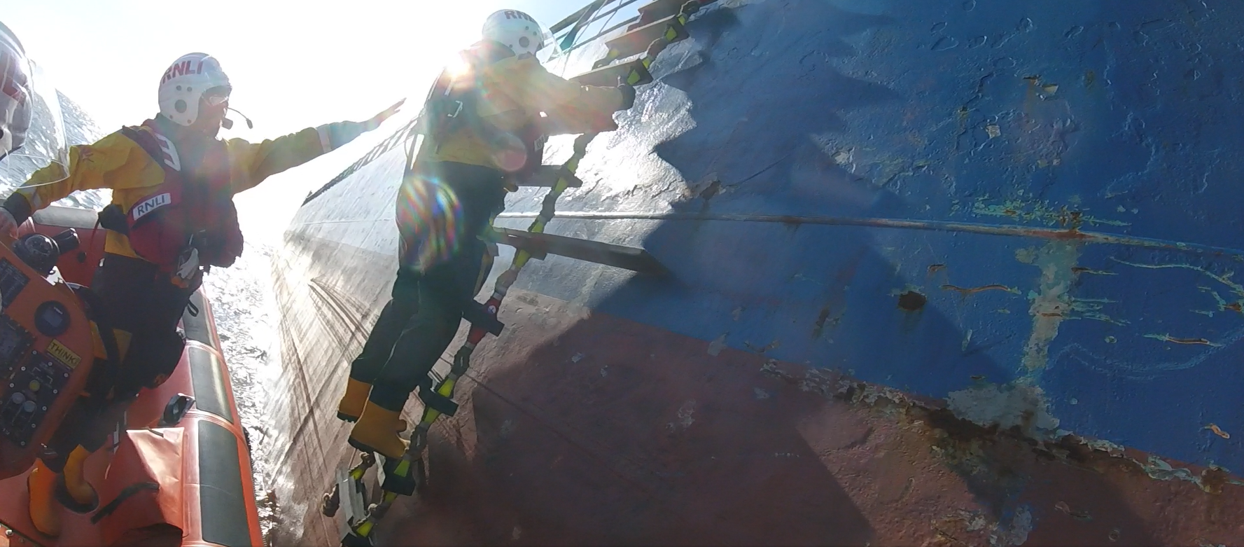Crew member Dave |Mitchell on the pilot's boarding ladder