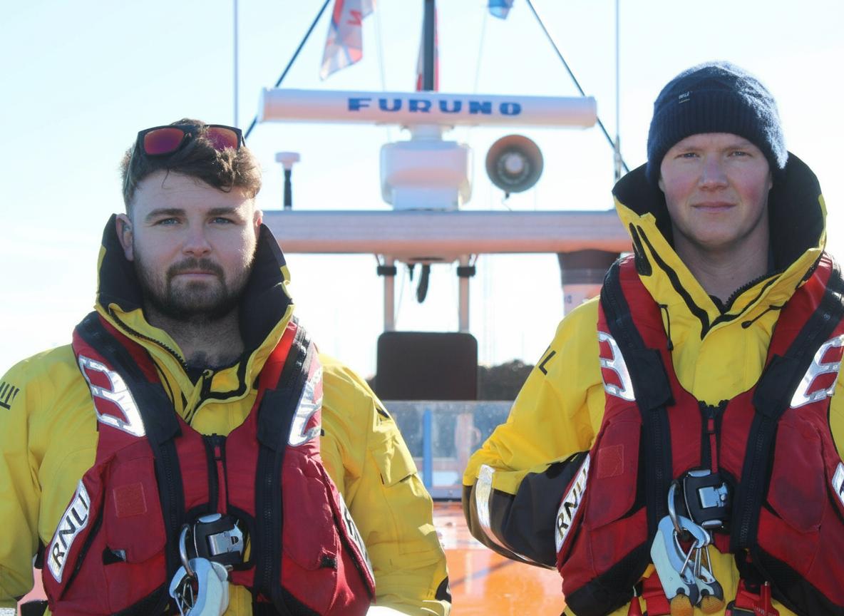 Graeme (left) is pictured with Josh onboard the Shannon class all-weather lifeboat