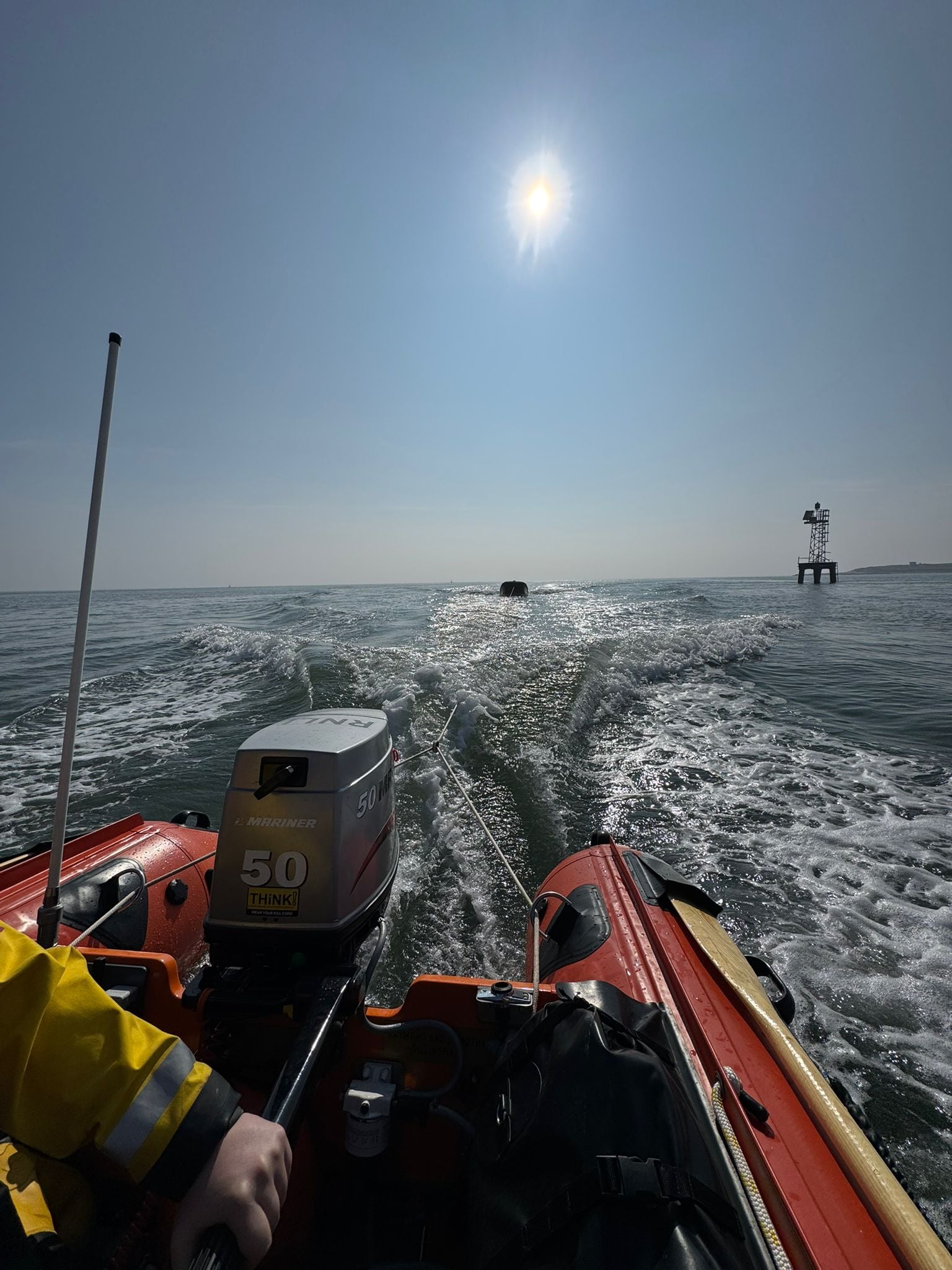 Barrow ILB towing casualty dinghy