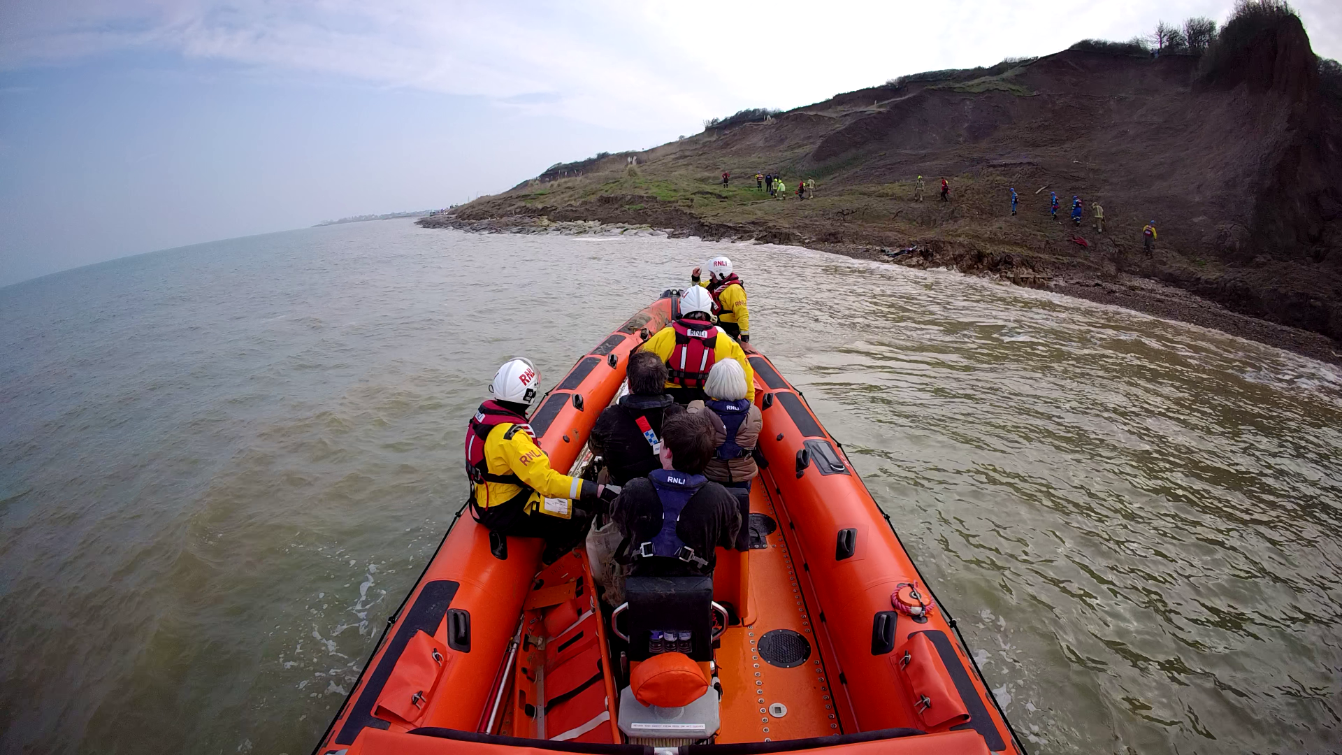 The casualties are transferred to firmer ground following the mud rescue on the cliffs at Warden Bay, Isle of Sheppey on Sunday afternoon.