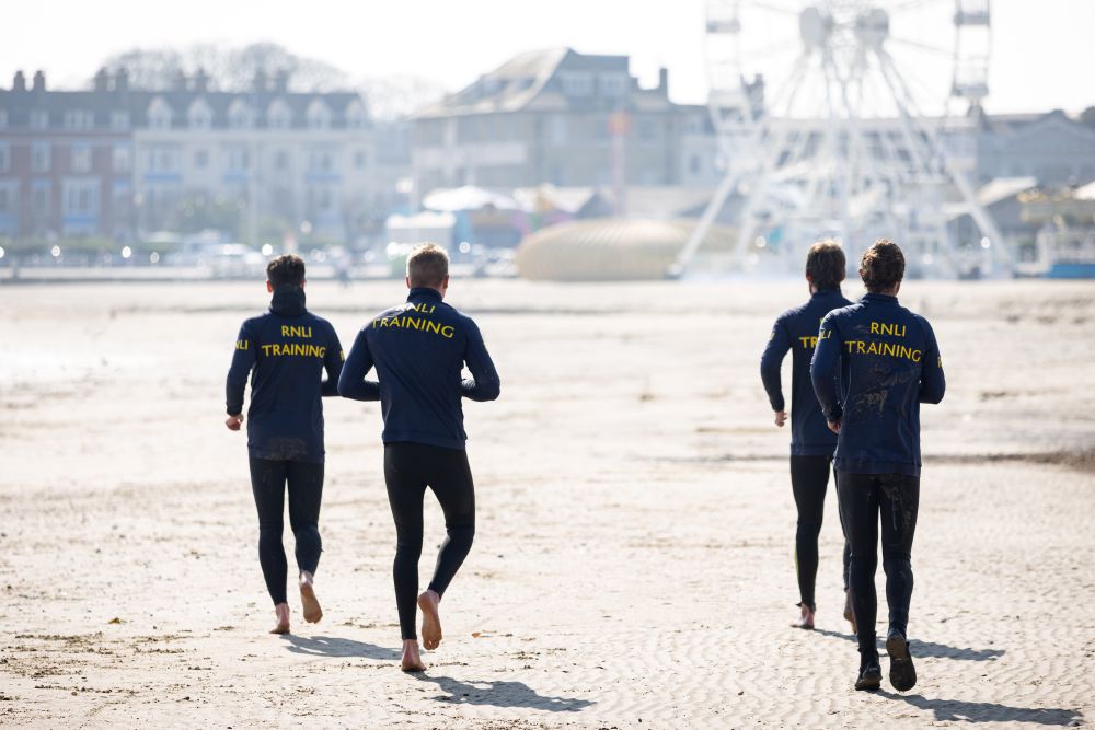 RNLI lifeguards on Weymouth carrying out fitness tests