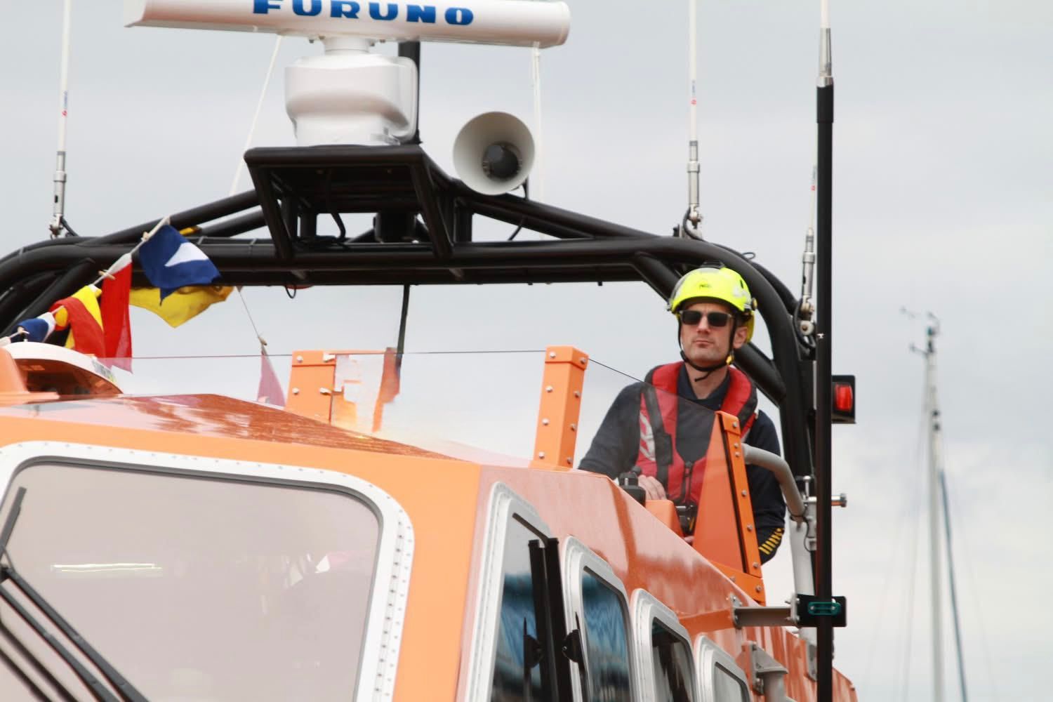 Dan Measor, volunteer crew, at the top of Shoreham's all-weather lifeboat