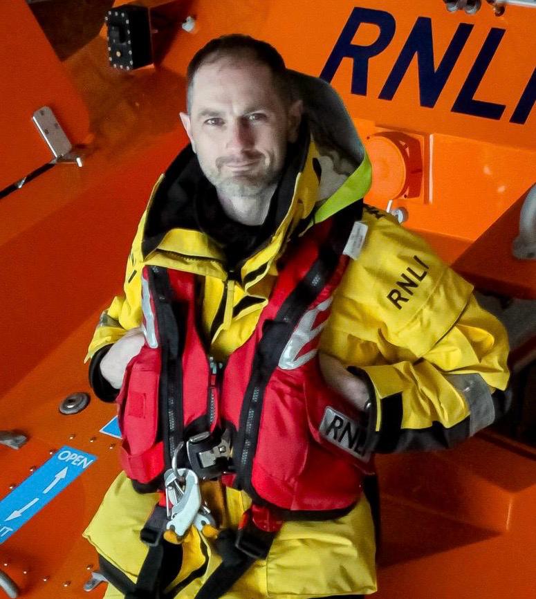 Dan sat at the front of Shoreham RNLI's all-weather lifeboat