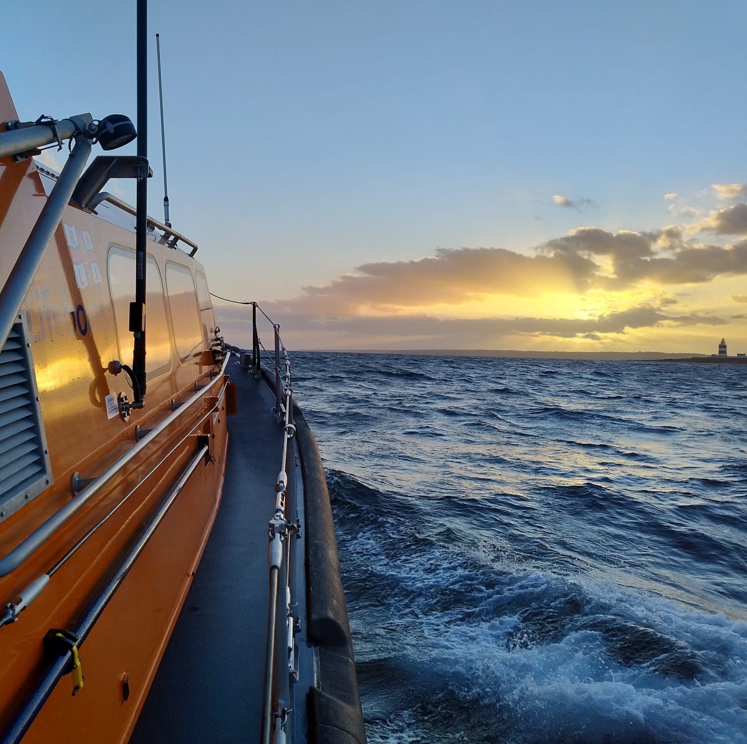 Image of Hook Head lighthouse at sunset